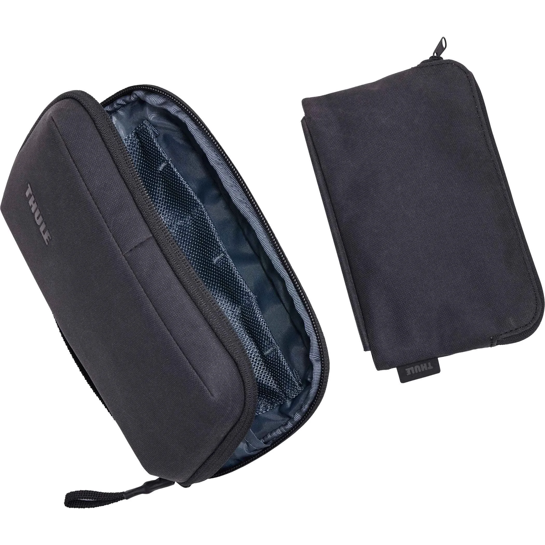 Open Thule Aion travel organizer with a detachable zippered pouch beside it