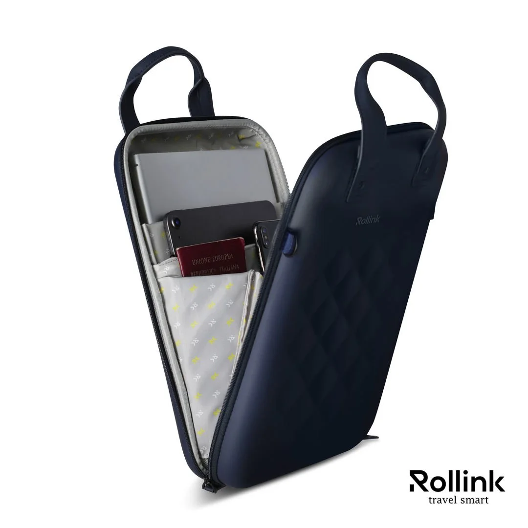 Open navy Rollink Go vertical laptop case showing the padded laptop sleeve and front pocket