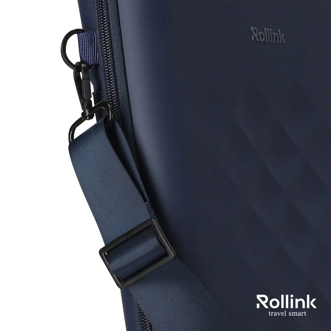Close-up of a navy Rollink Go laptop case with the adjustable shoulder strap attached