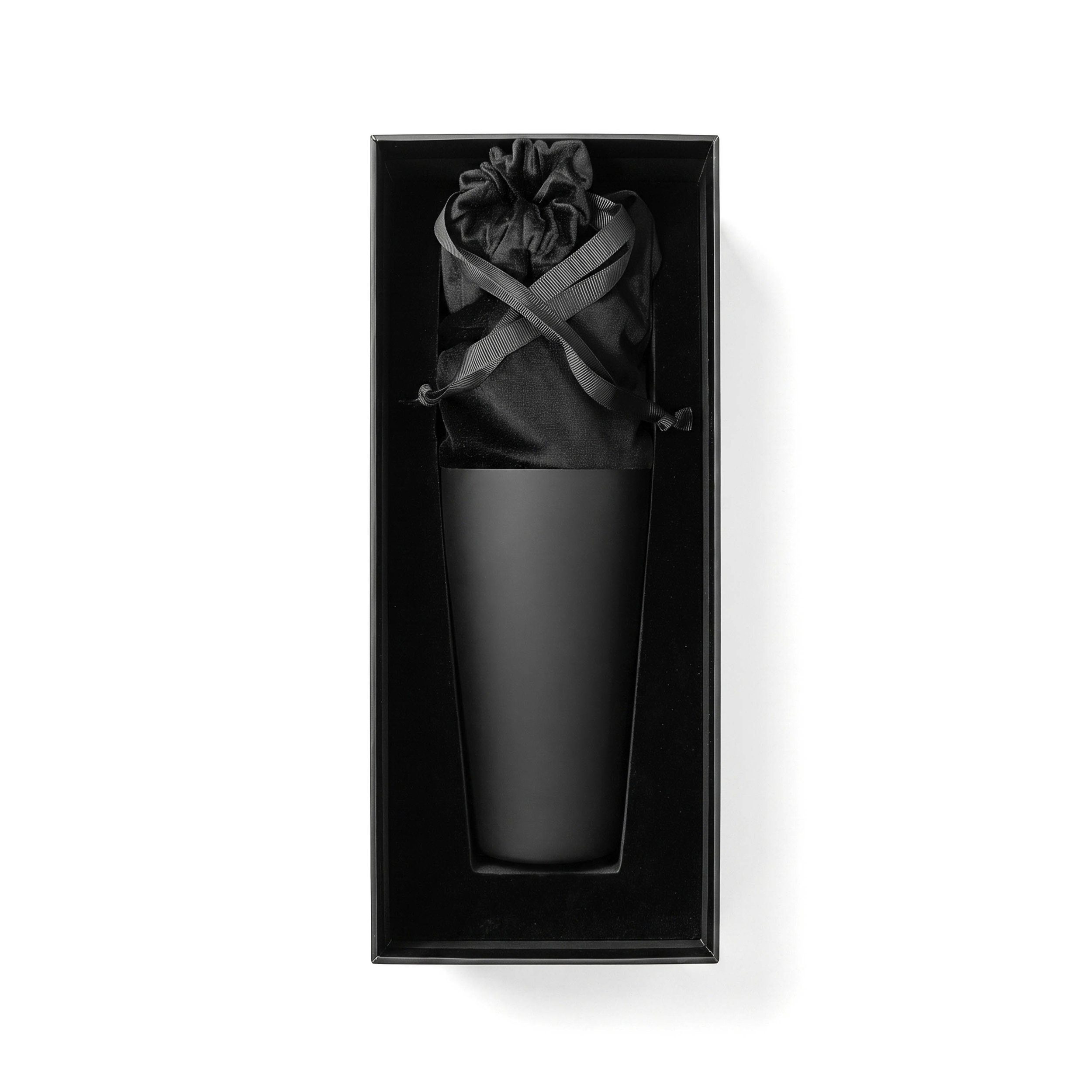 Shaker nestled in its black velvet-padded gift box, cinched with a black ribbon bow before the lid closes, packaged for Canadian delivery.