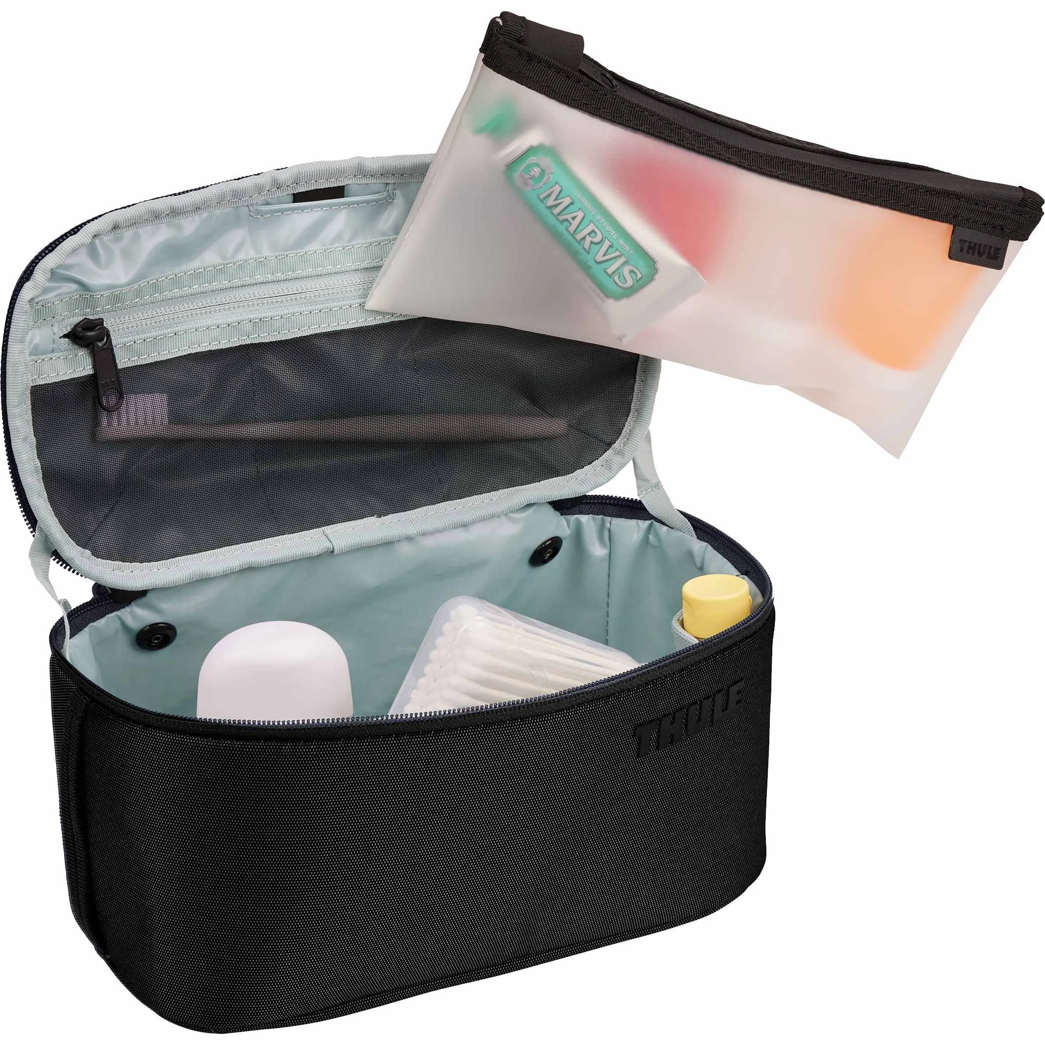 Open Thule Subterra 2 toiletry bag with a removable clear pouch lifted out