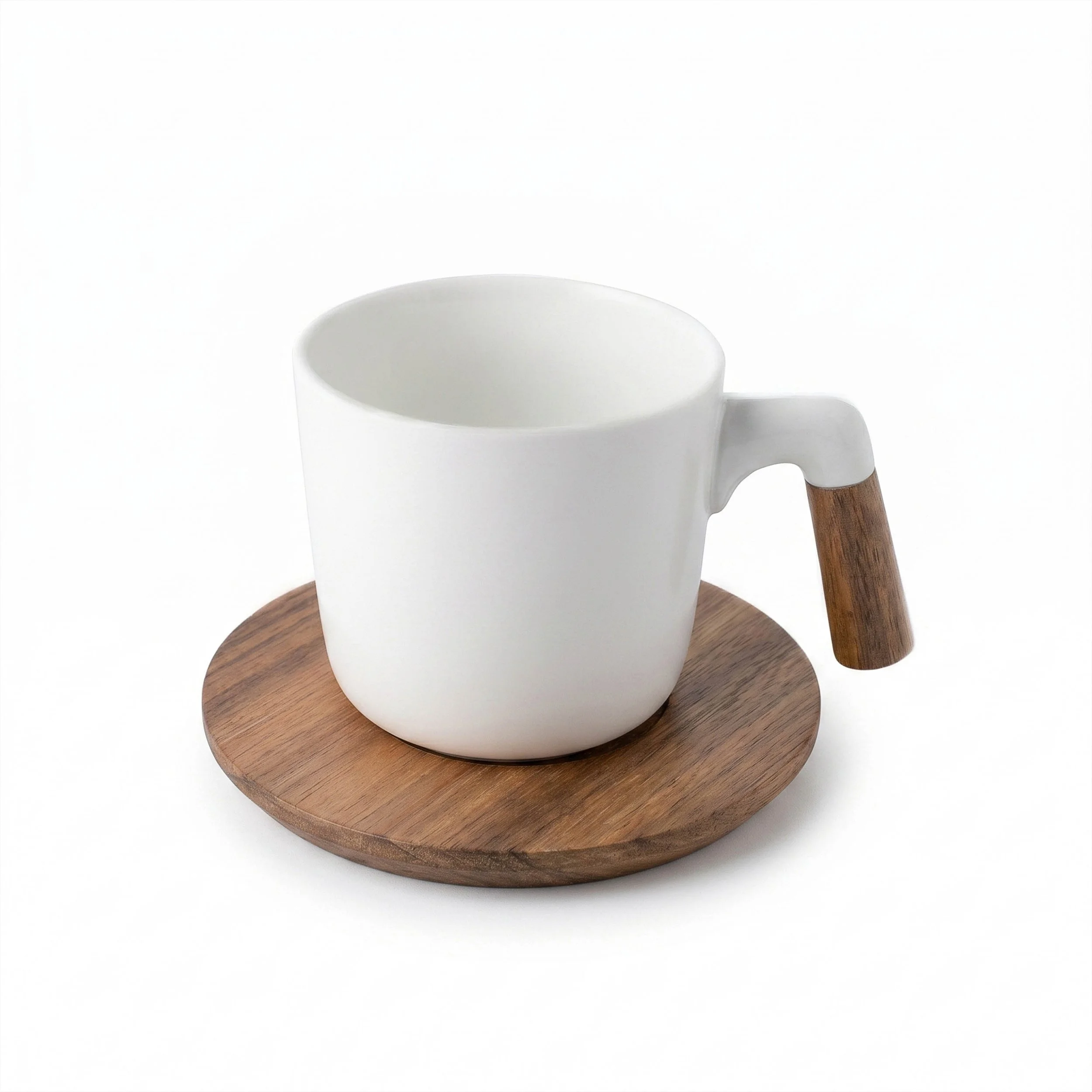 Close-up of a single white stoneware cup with its acacia wood handle, resting on the matching round coaster.