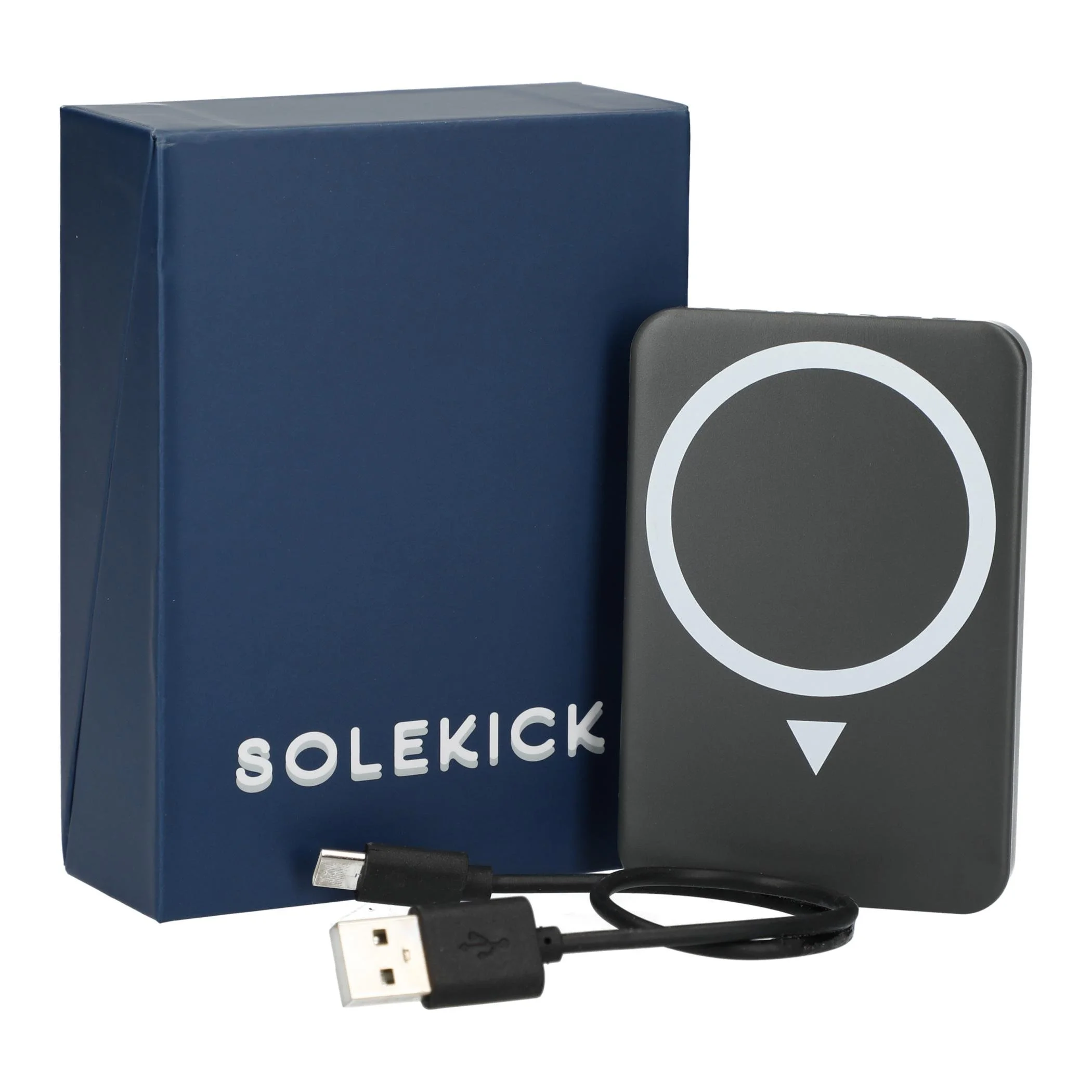 Navy gift box beside a magnetic wireless power bank with a round charging ring and a coiled USB charging cable