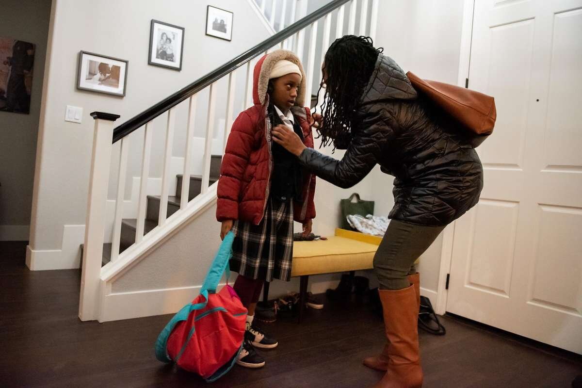  Lateefah Simon, BART’s new board president and a single mom. gets her daughter Lelah ready for a Lyft ride to pick them up in order for Lelah to get to school. 