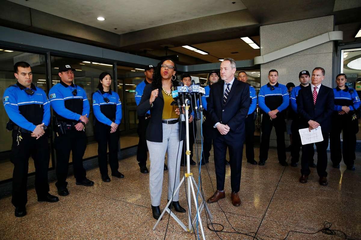  BART board President Lateefah Simon (center left) talks about the new BART ambassador program at a news conference as director Bevan Dufty waits to speak. 