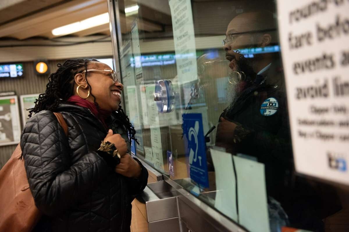  Lateefah Simon, BART's new board president and a single mom who is legally blind, speaks to a BART employee at the Richmond BART station during her morning commute on January 16, 2020 in Richmond, Calif. 