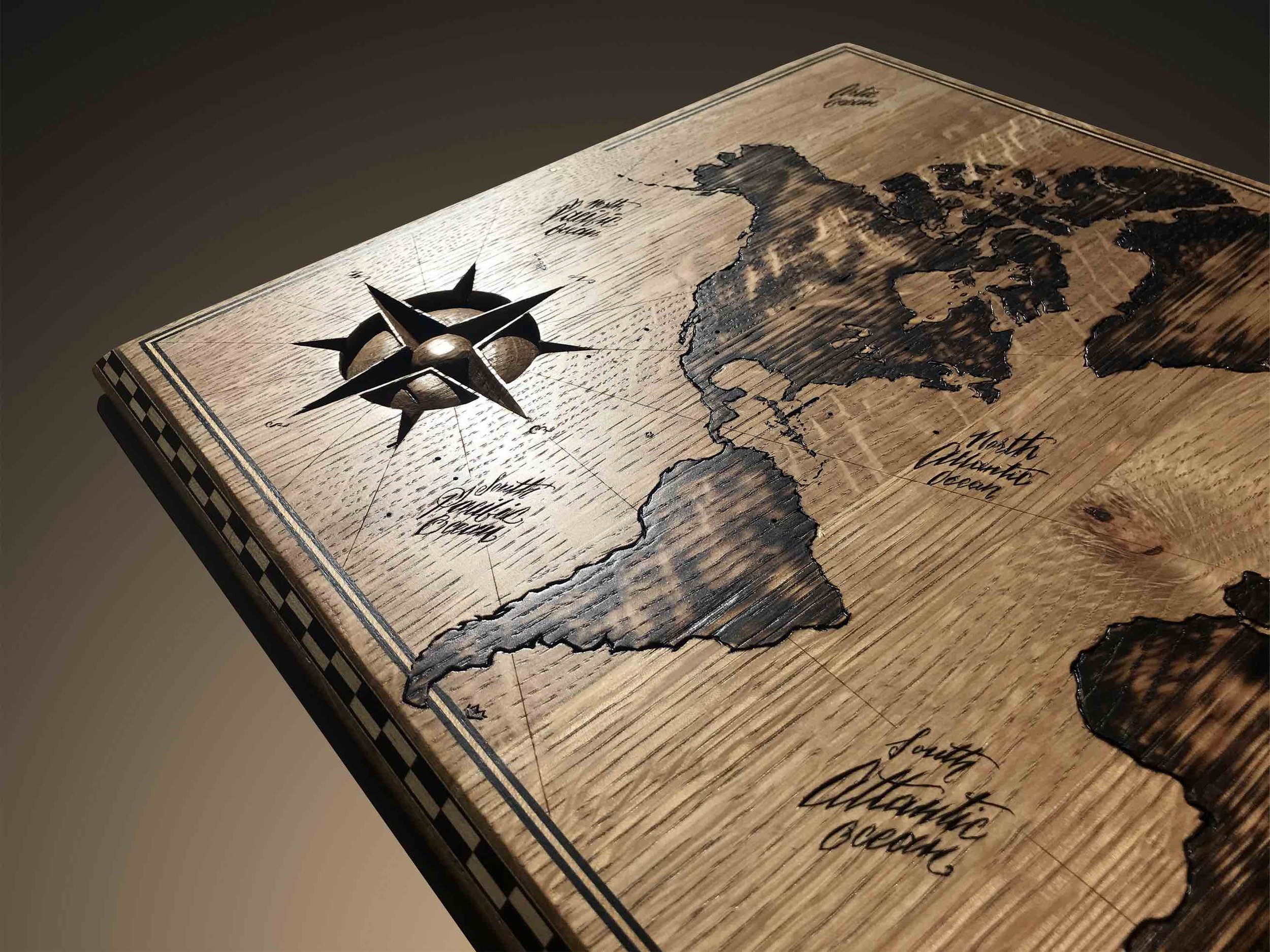 wooden carved and burned map and compass rose.jpg