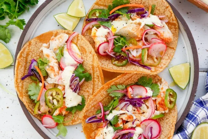 Grilled Fish Tacos with Lime Crema and Spicy Quick-Pickled Vegetables