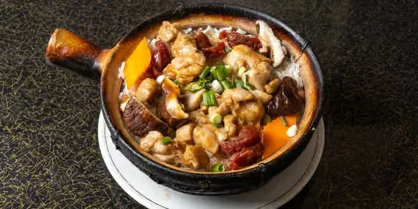 Chicken with dried mushrooms over clay pot rice at Clay Pot House