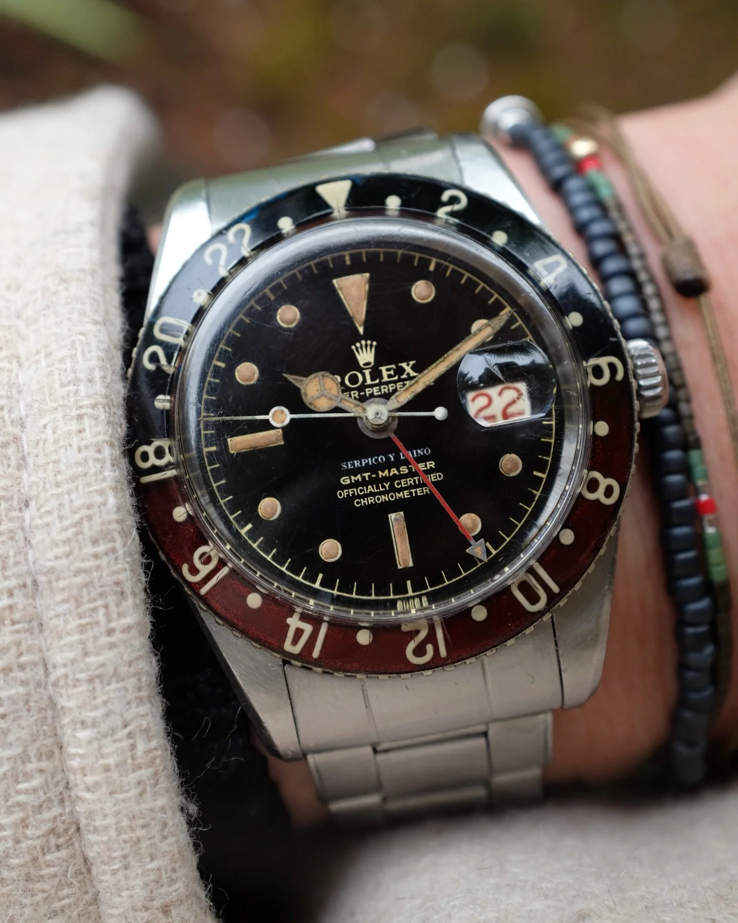 A gorgeous Rolex GMT-Master 6542 that was originally sold by the famed Venezuelan retailer Serpico Y Laino and was owned by a man who wore it everyday throughout his career working for Holland America Line, a cruise ship and transport company that to
