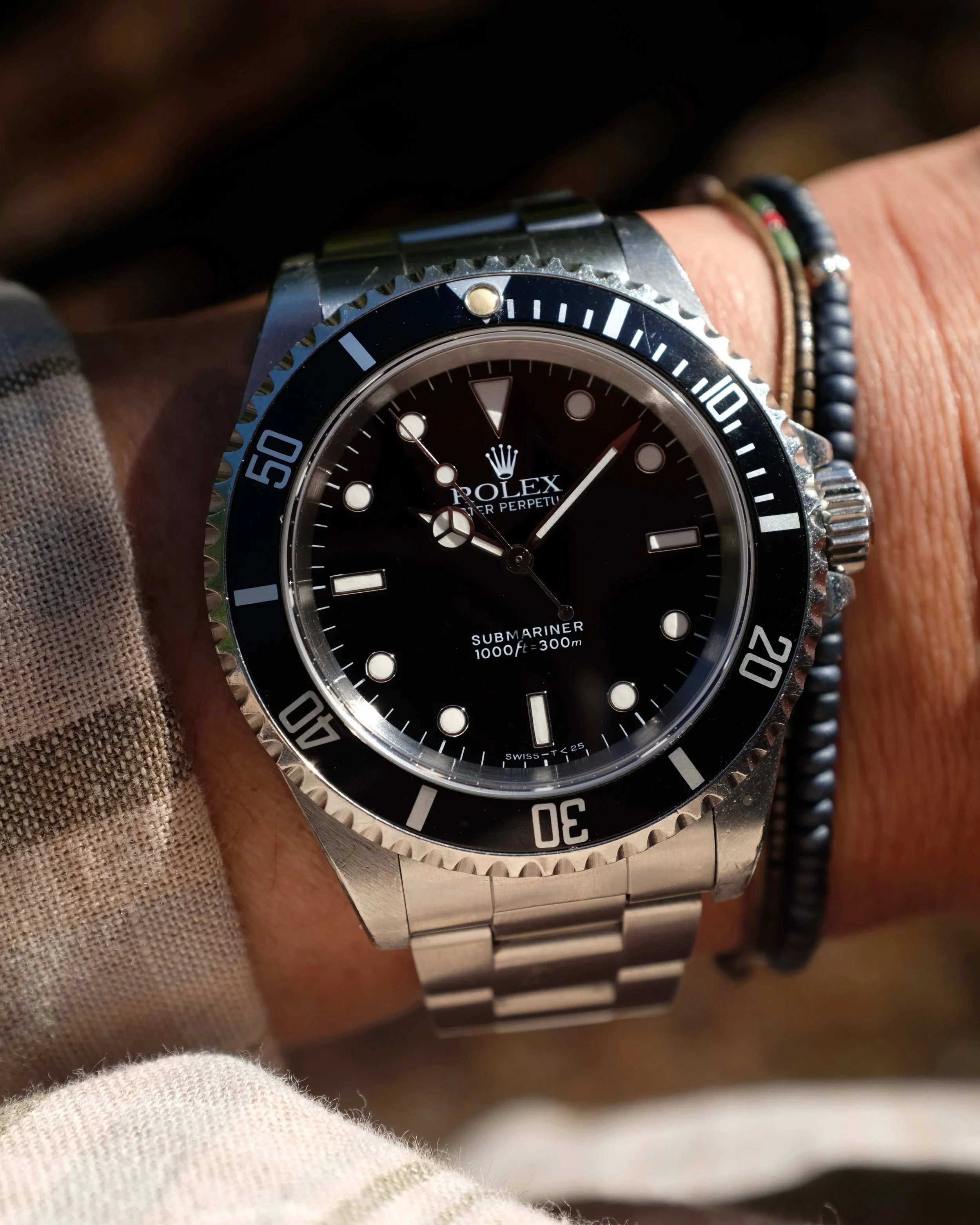 No frills or gimmicks, just one of the best everyday luxury tool watches you can own in sharp, unpolished, &amp; unbothered condition. 

-1991 Rolex Submariner 14060