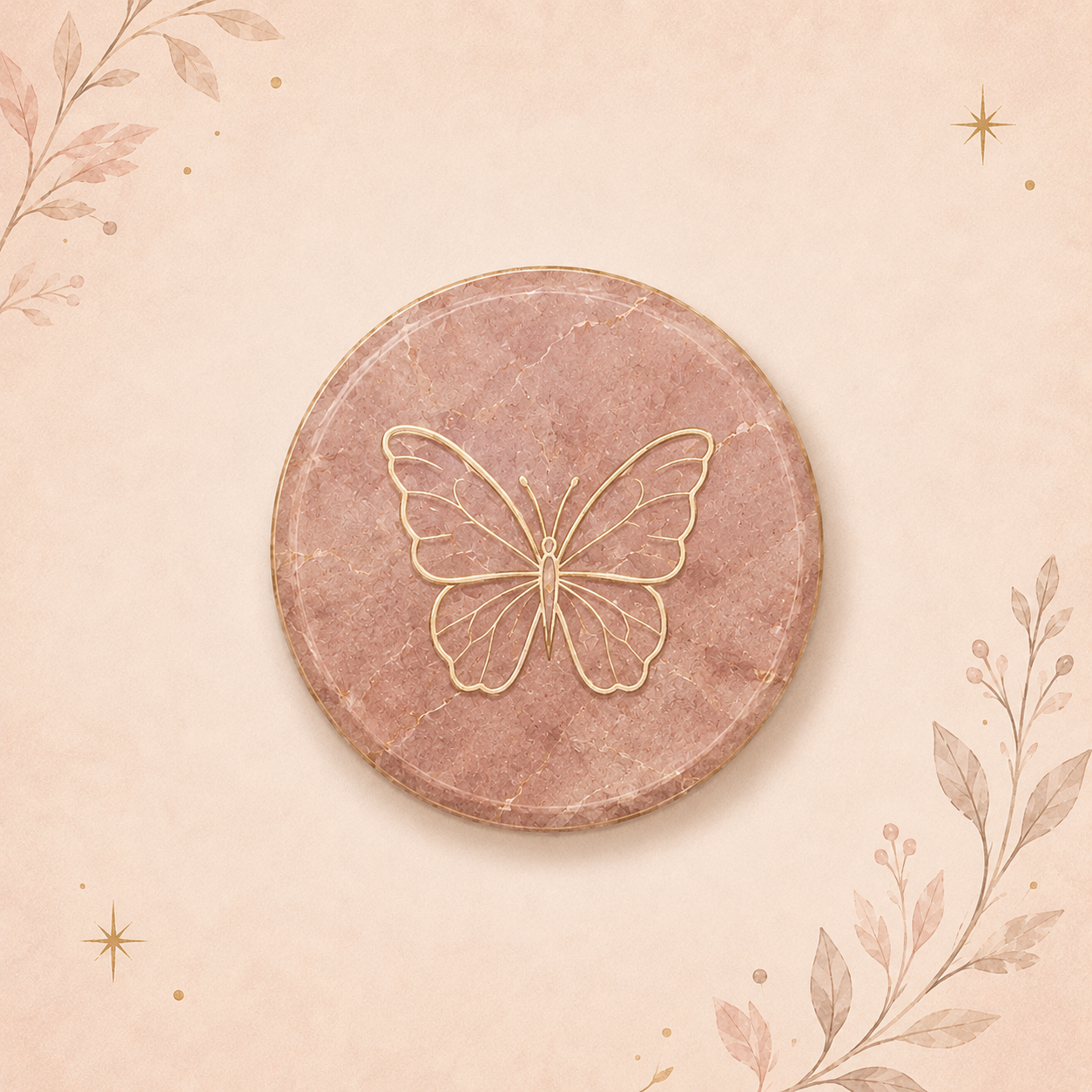 Decorative pink marble coaster with a gold butterfly wire sculpture on top, on a beige background with floral and star illustrations.