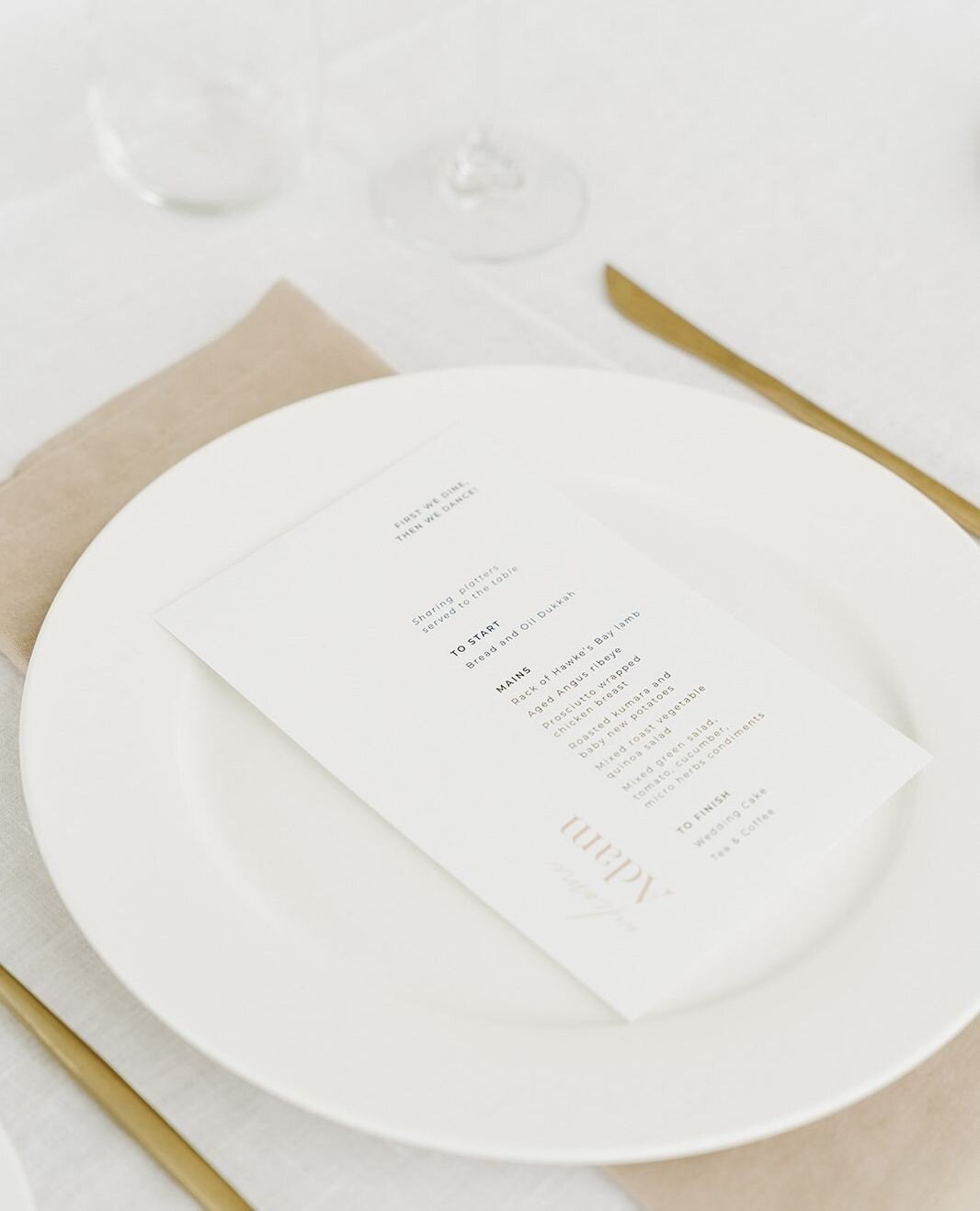 First we dine, then we dance x⁠
⁠
Modern, fresh &amp; elegant dinner menus in a colour palette of whites &amp; warm neutrals for the lovely Abbey &amp; Matt.⁠
⁠
Photographer @moments_and_waves_photography⁠
Wedding Planner - Best Day Ever⁠
Venue @bayl