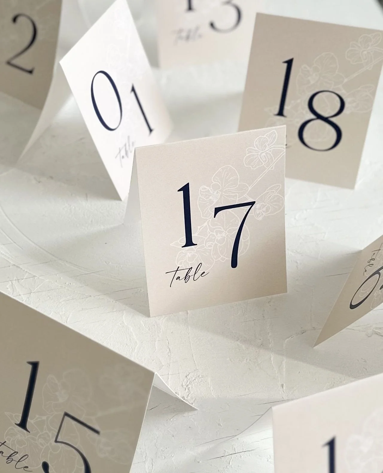 Custom Table Numbers for T&amp;M 🤍⁠
⁠
Love a bold + script typography moment, plus I'm slightly obsessed with these subtle orchid illustrations x