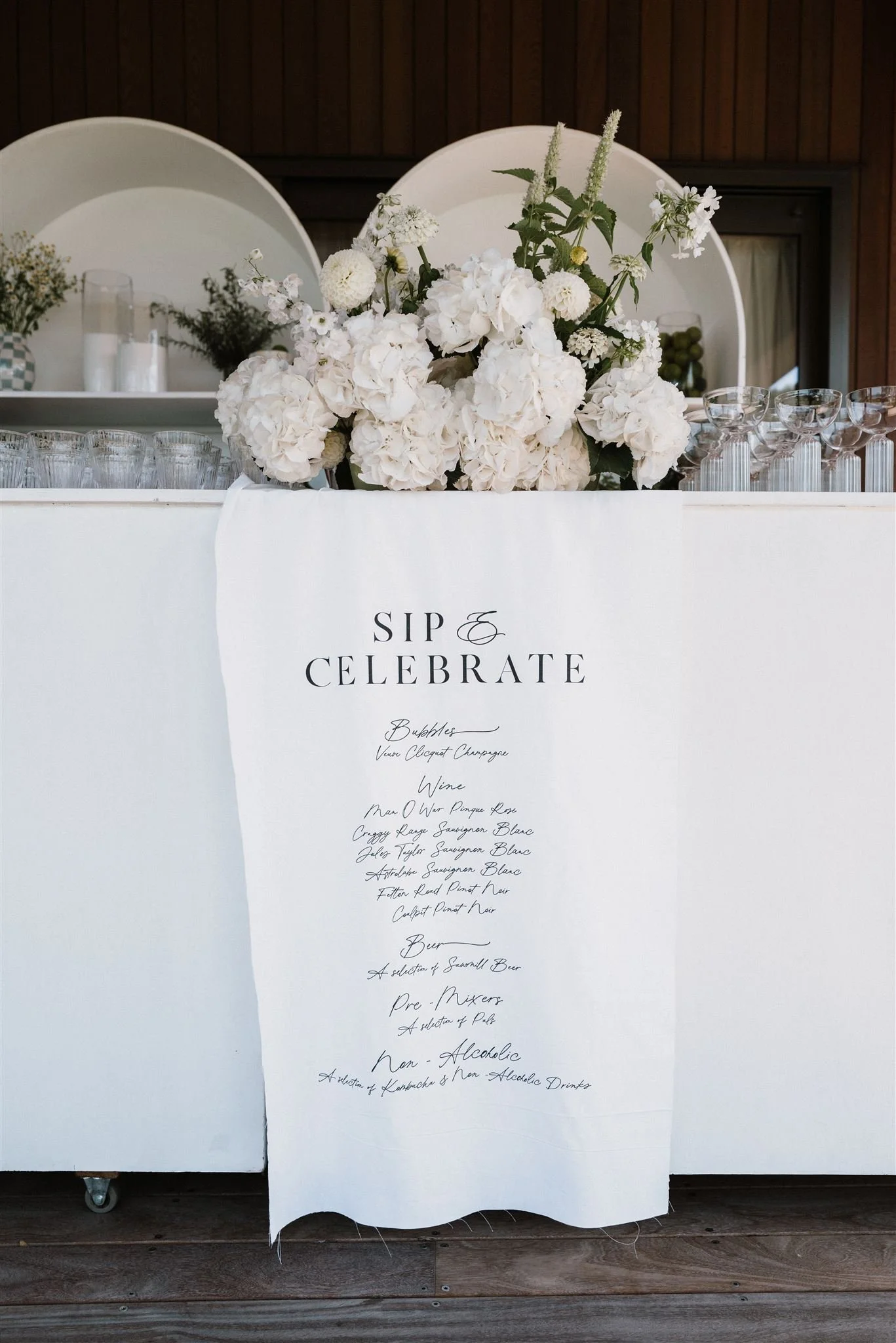 Fabric Wedding Drinks Menu over bar