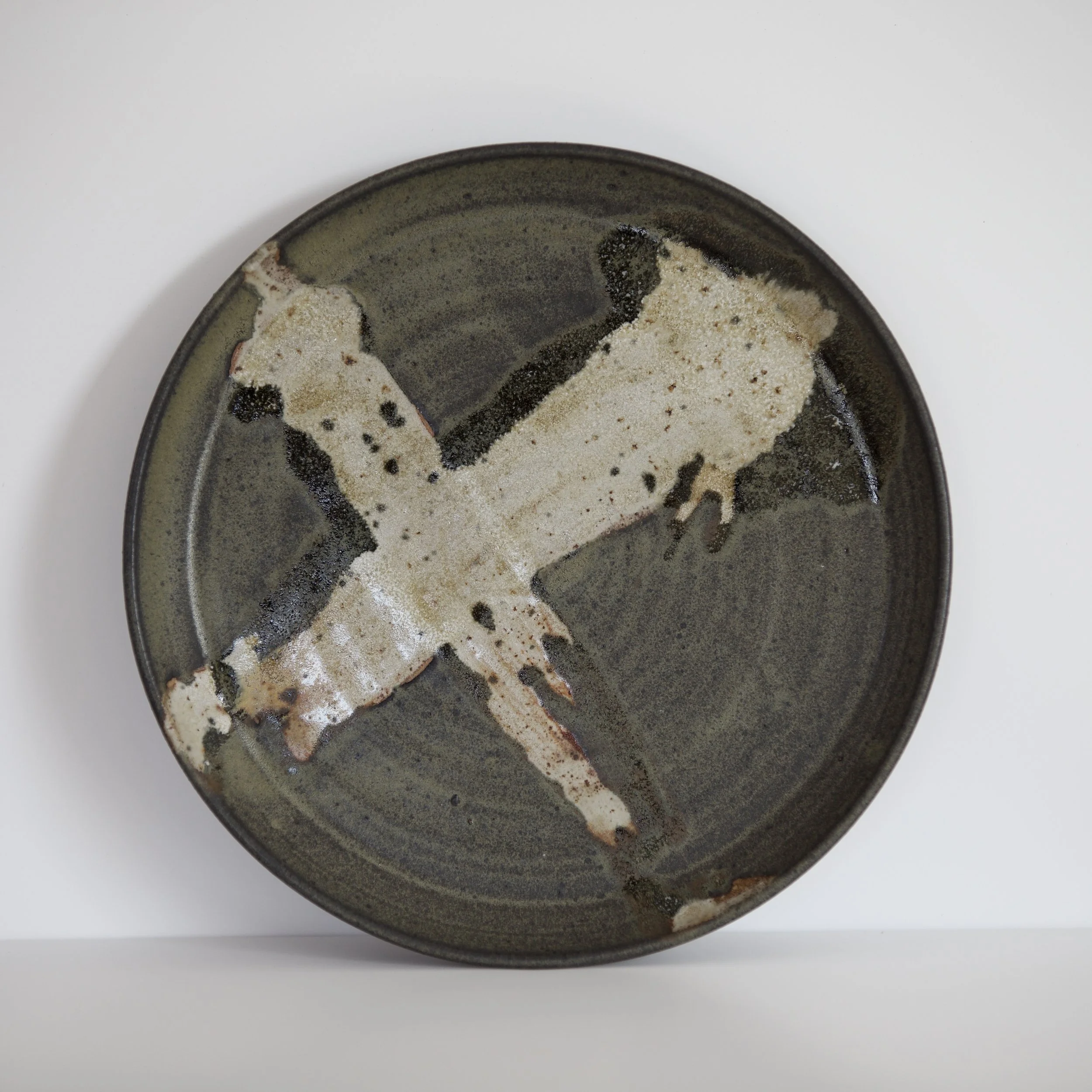 Small Plate with Dark Black/Green Glaze and Light Cross