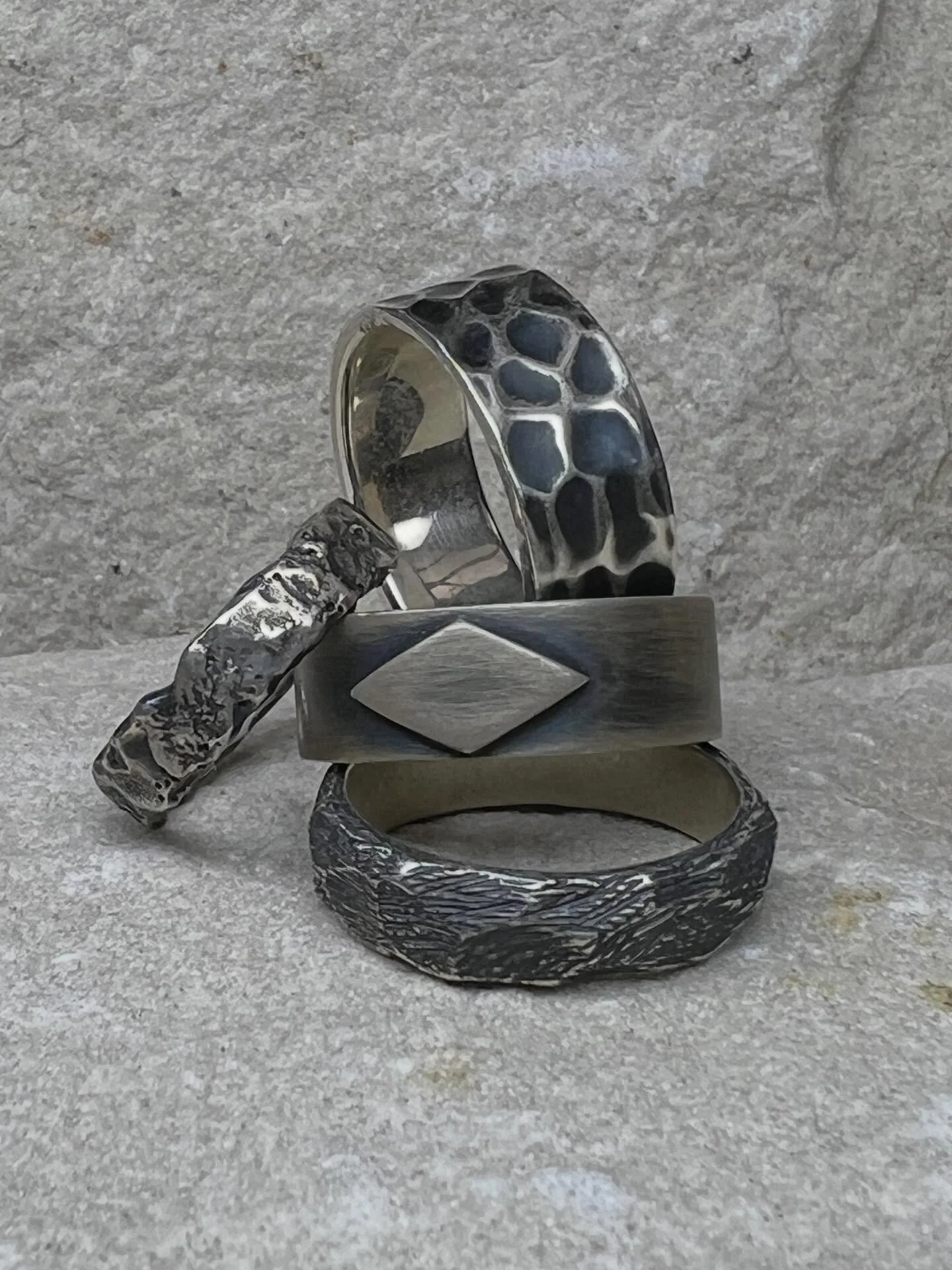 If craggy and natural is your jewellery thing, this group of silver rings with their textures and oxidation make a statement with a dark edgy vibe. Oxidation is the process that darkens the recesses and emphasise the surface interest. Come and check 