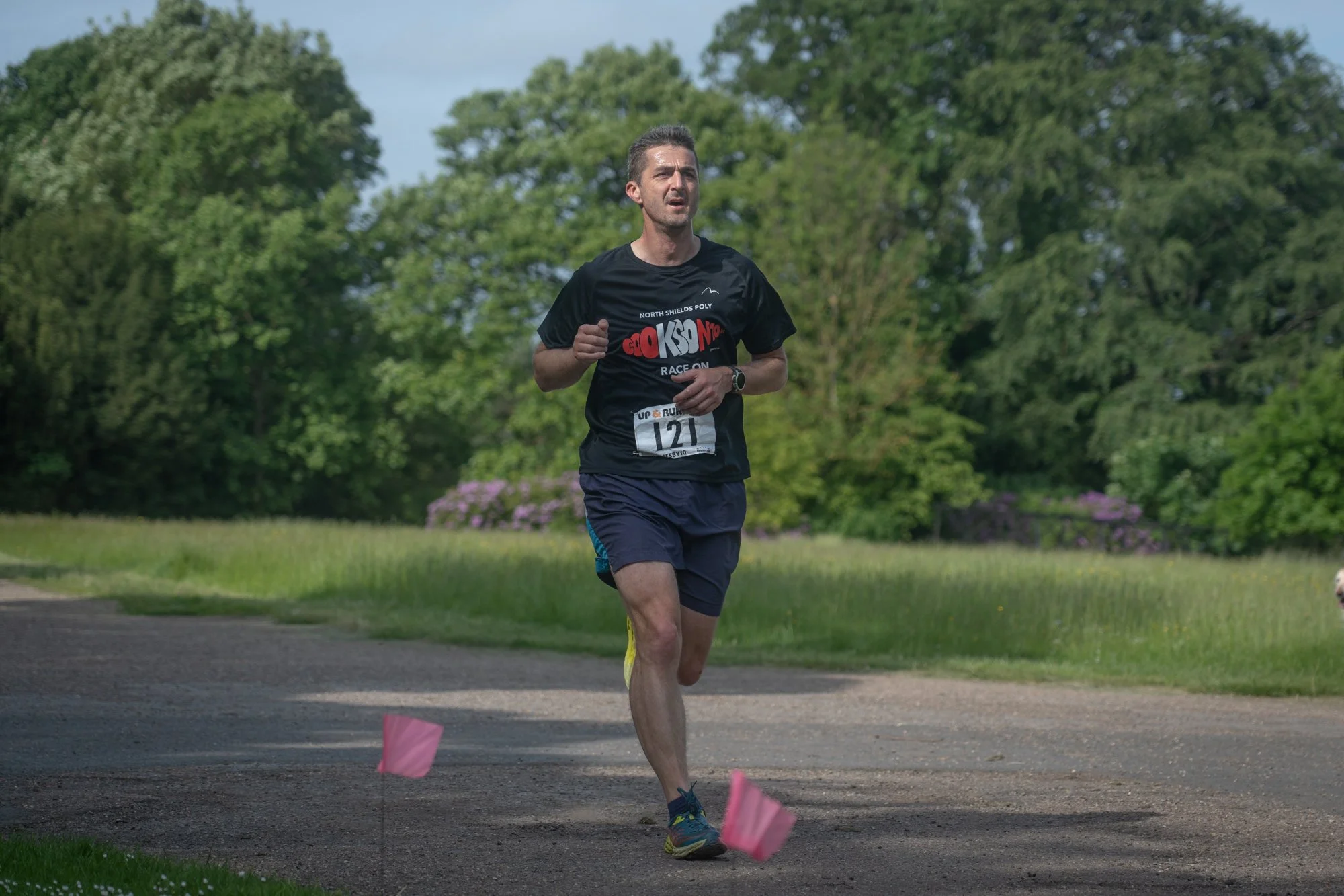 runner crossing the finish line