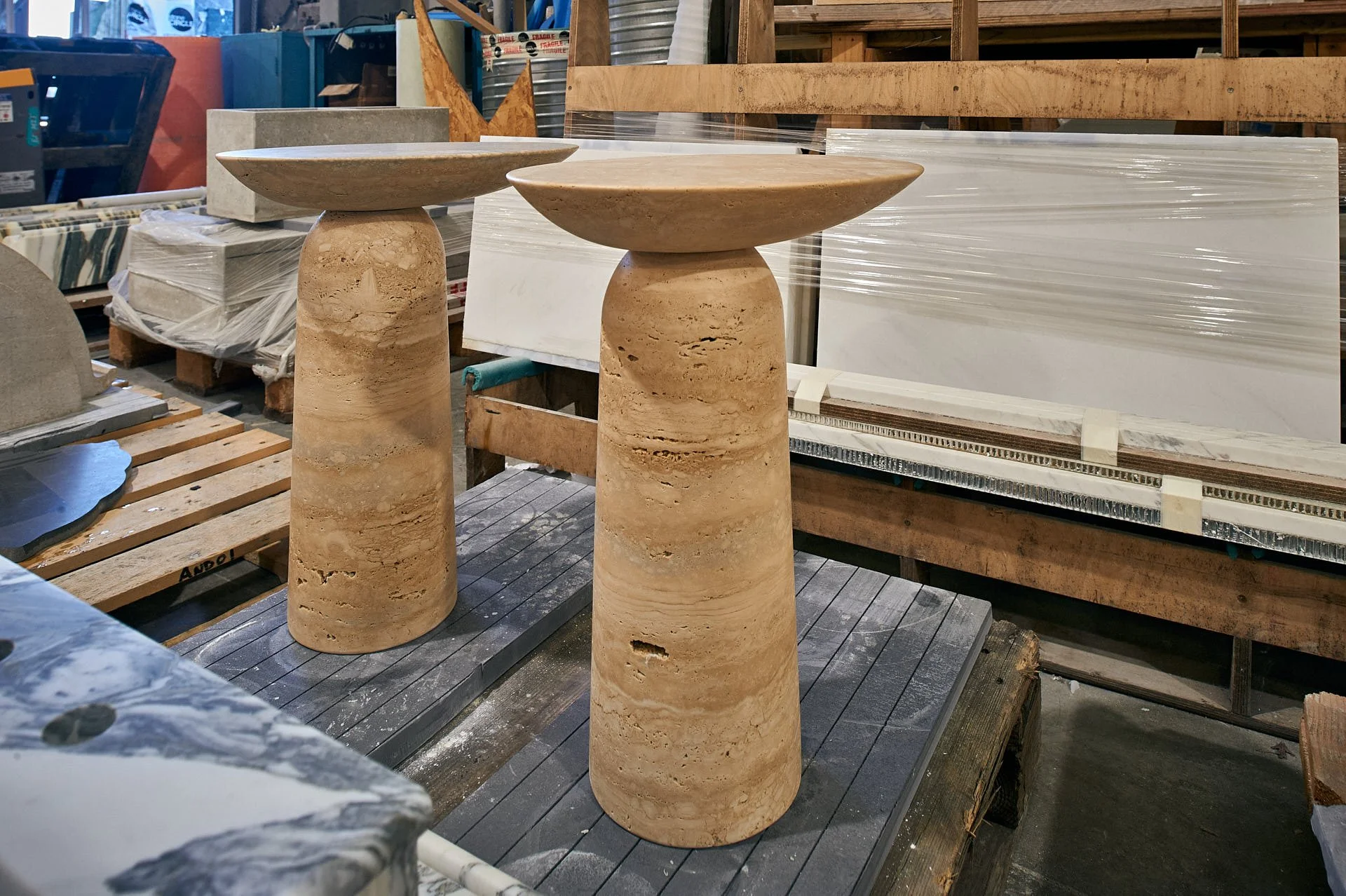 Travertine round tables by stoneCIRCLE, photo Marco Joe Fazio Creatives