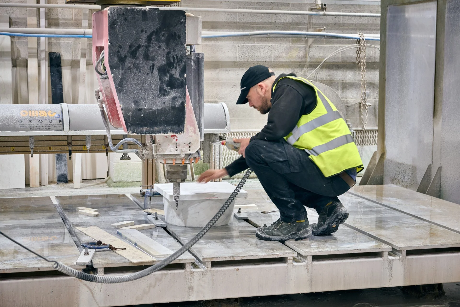 stoneCIRCLE factory -CNC machine carving a Carrara marble topstone for the Hull Maritime Waymarkers - photo Marco Joe Fazio Creatives