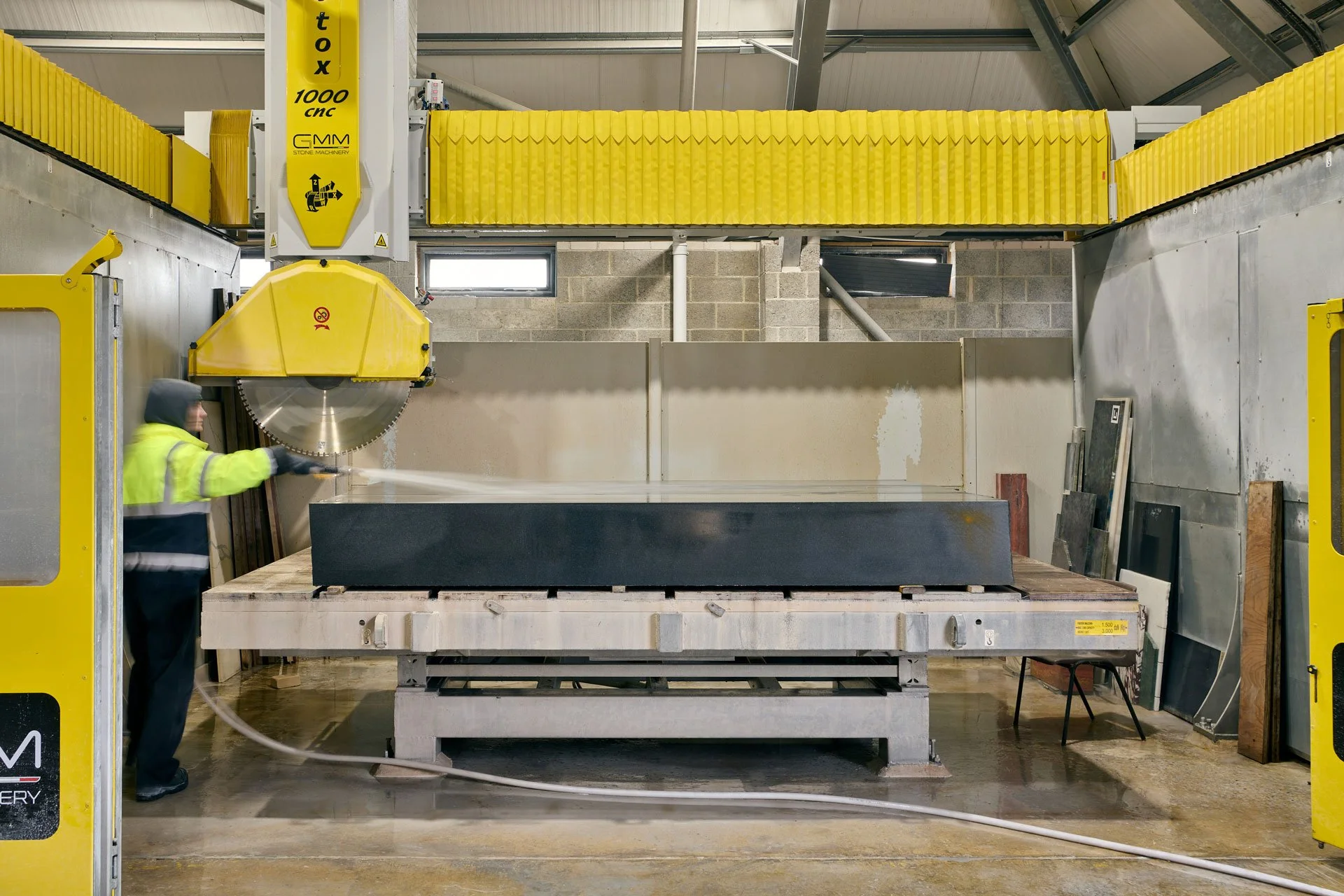 A block of Zimbabwe Black granite on our CNC saw - photo Marco Joe Fazio Creatives