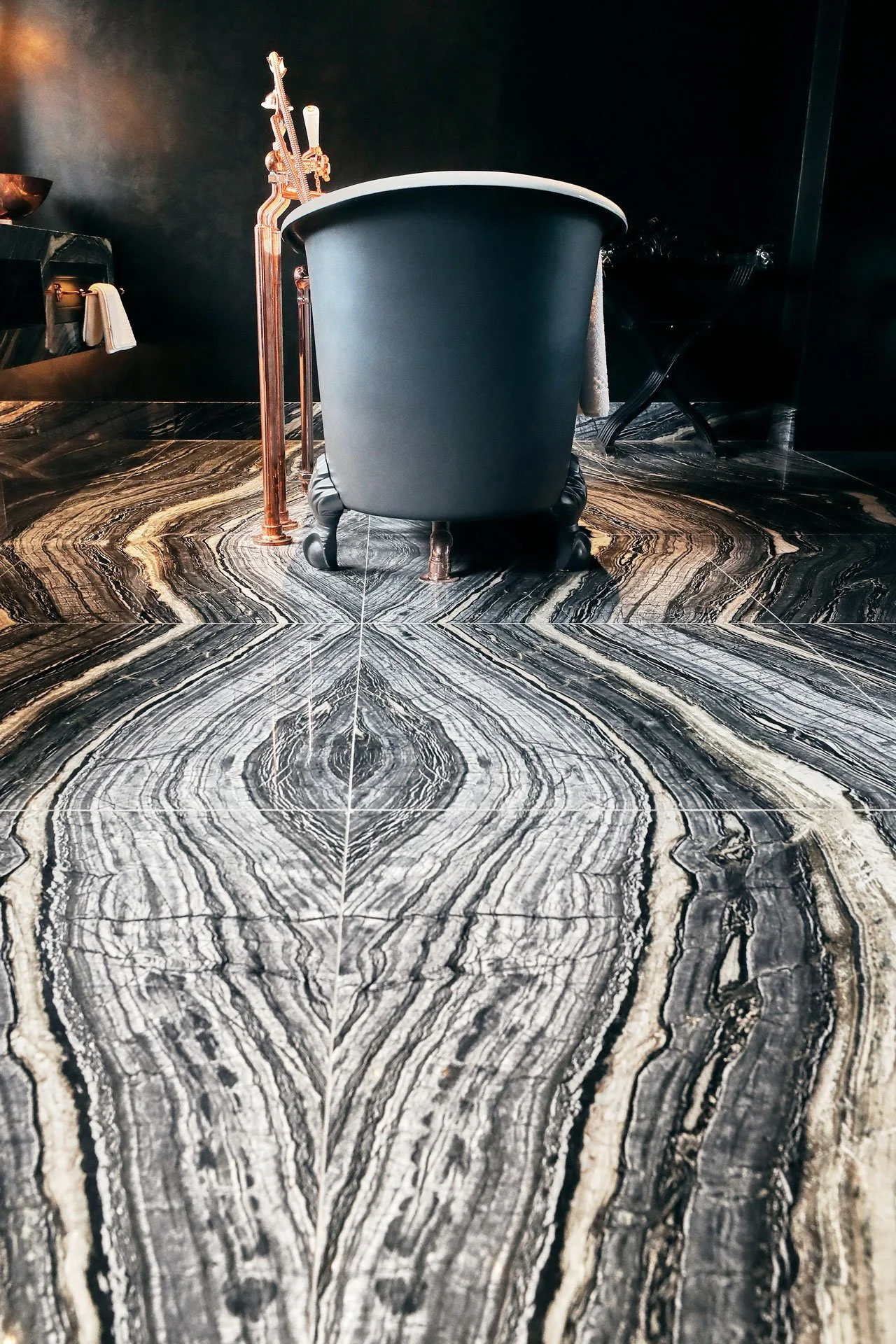 Bookmatched stone floor at The Mandrake Hotel, London