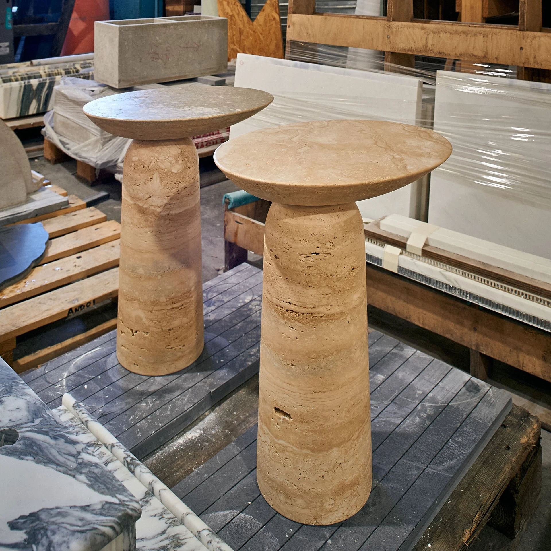 Travertine round tables by stoneCIRCLE, photo Marco Joe Fazio Creatives