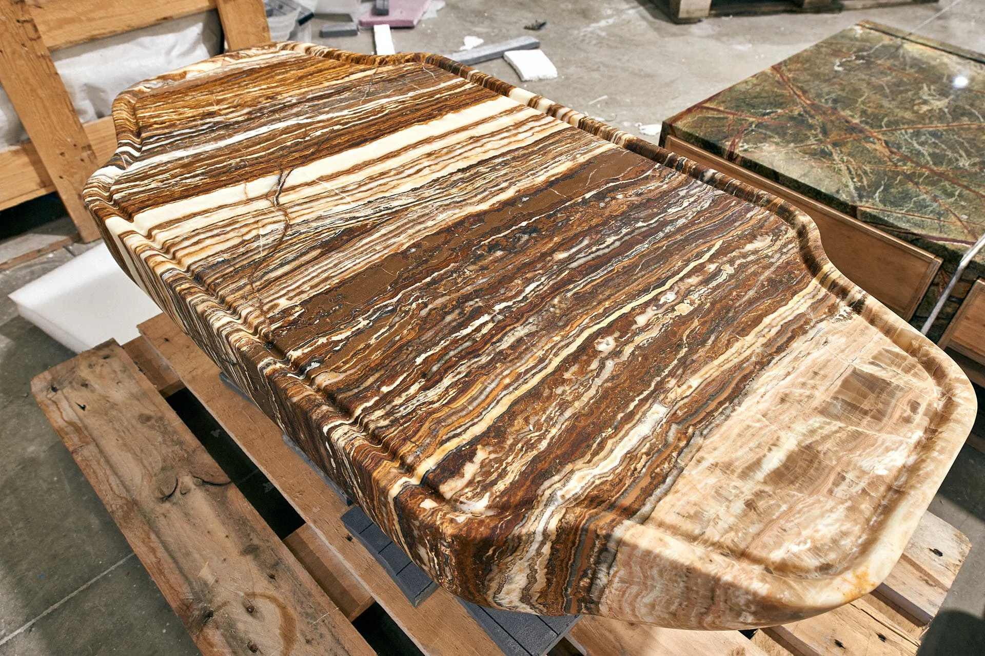 Tiger Onix anvil-shaped table by stoneCIRCLE, photo Marco Joe Fazio Creatives