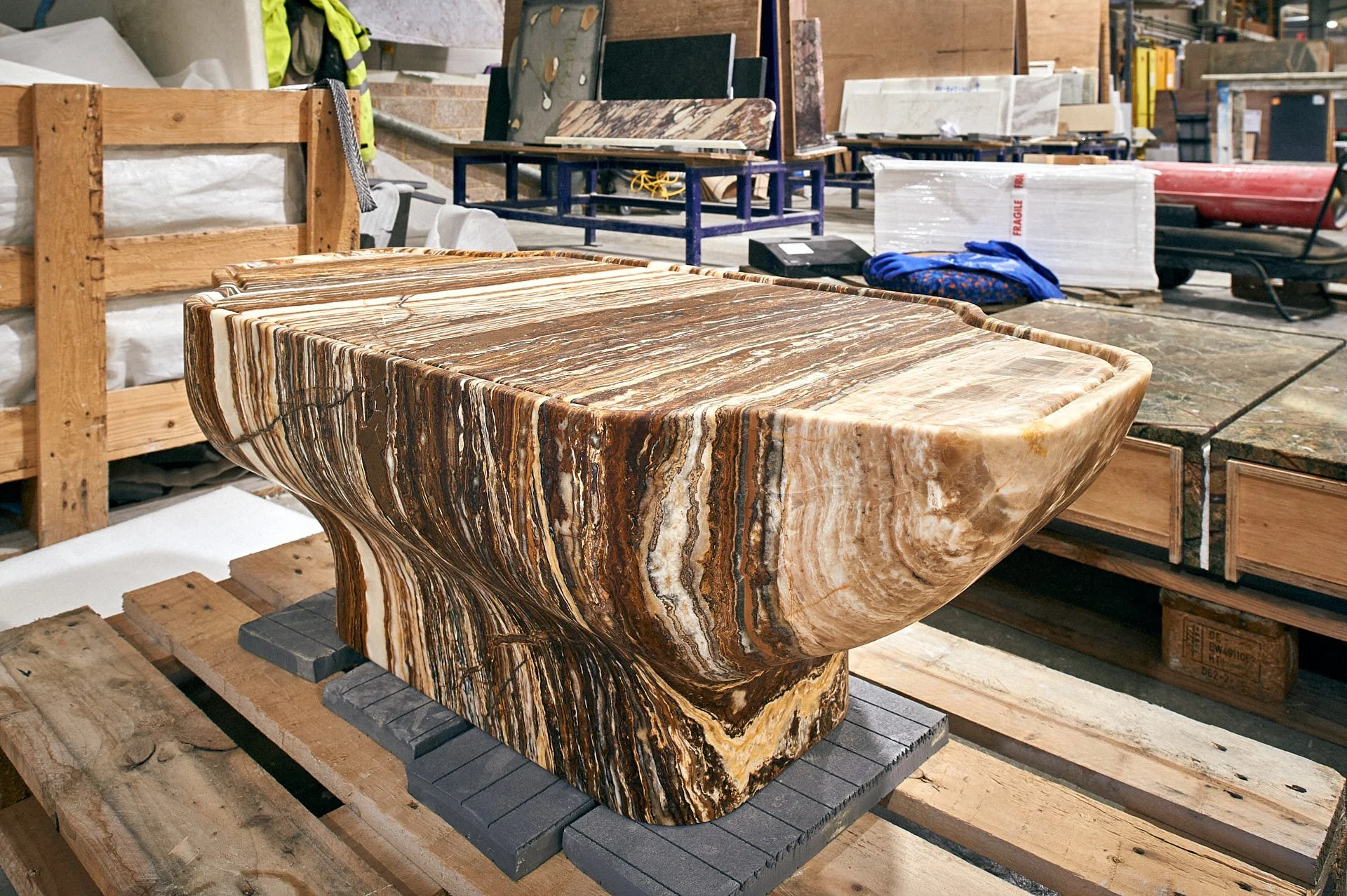 Tiger Onix anvil-shaped table by stoneCIRCLE, photo Marco Joe Fazio Creatives