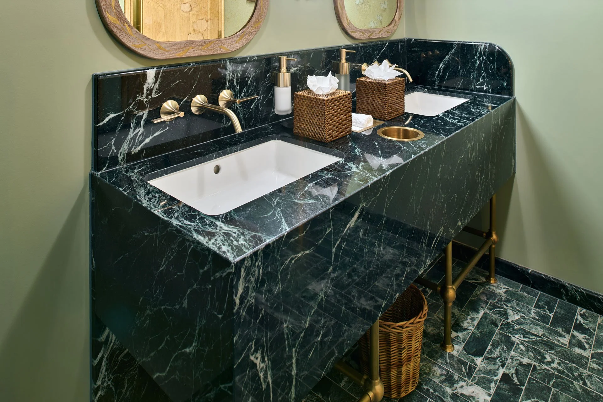 Natural stone vanity or bathroom surface in a commercial or hospitality interior - photo Marco Joe Fazio Creatives