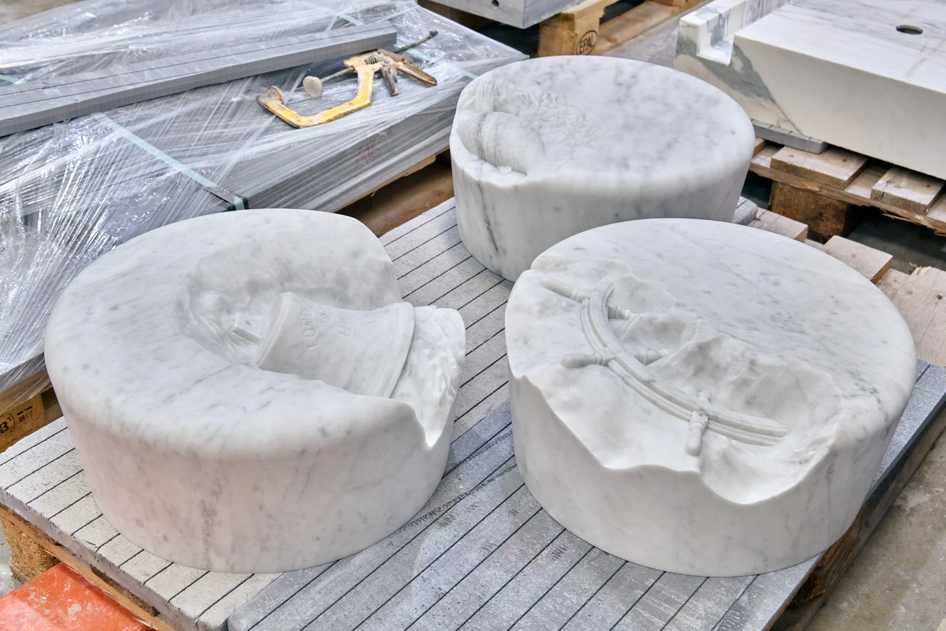 Carrara marble topstones in progress inside stoneCIRCLE’s Basingstoke stonemasonry factory - photo Marco Joe Fazio Creatives