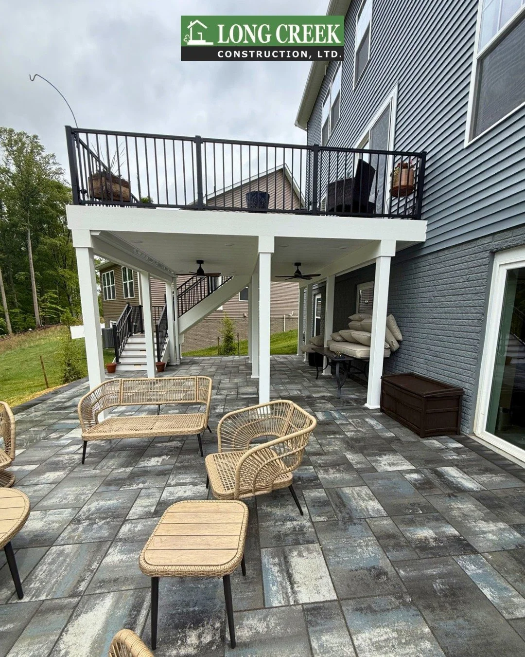 Check out this project we just completed in Upper Marlboro! 
We majorly upgraded this customer's outdoor living area with a @cambridgepavers patio, sitting wall, and a beautiful @trexcompany deck with black aluminum railings. 🖤
Perfect for hosting a