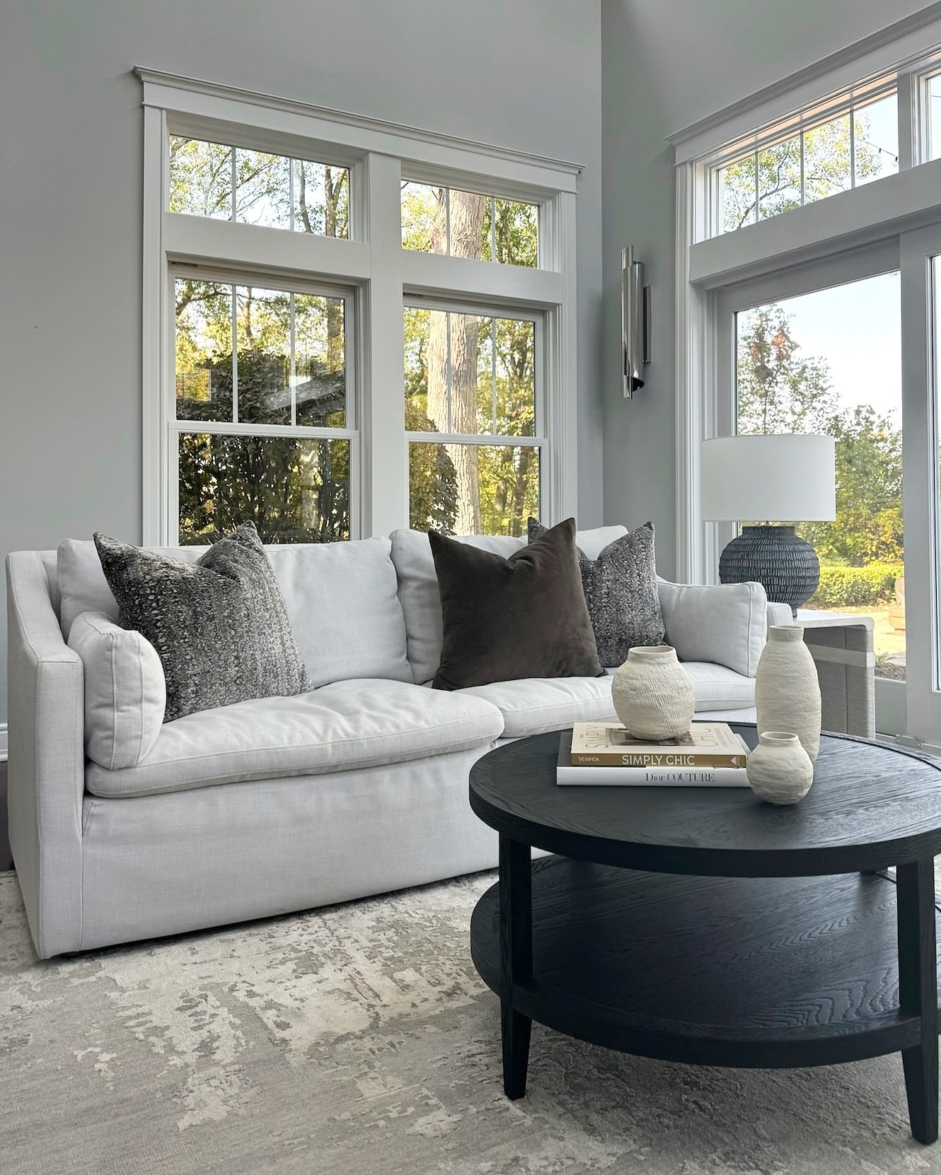 A sunlit sanctuary! Two views of this inviting sunroom, where natural light and cozy details create a perfect space to relax and recharge. 

#imaginethatdesign #sunroom #cozyhome