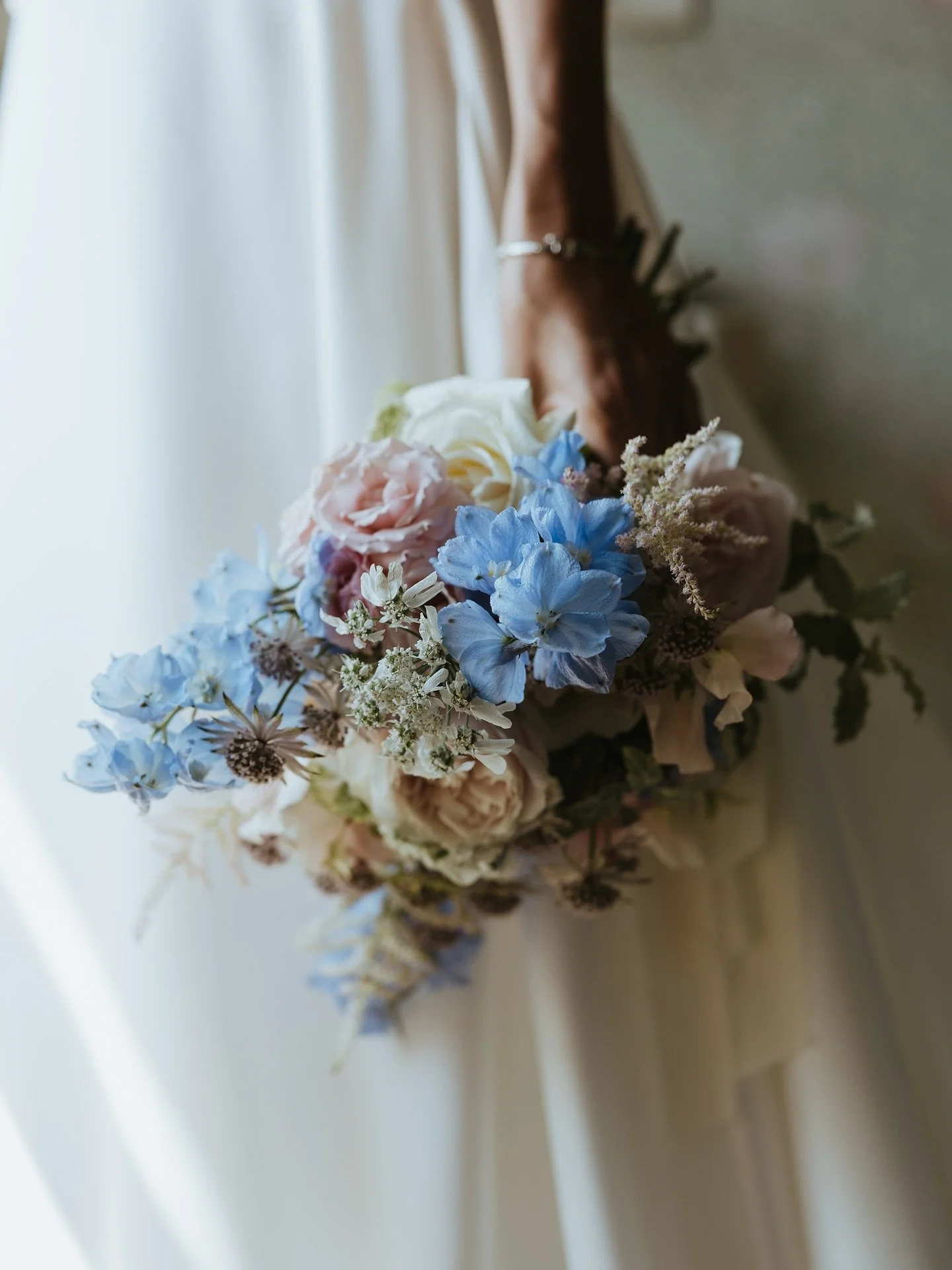 Oh, the bouquet. 

Not just a bunch of flowers but a personal statement. 
Your bouquet will likely be a sample of the flowers and style you have chosen for your entire wedding day, but they are also an extension of you, your chosen outfit. From the c