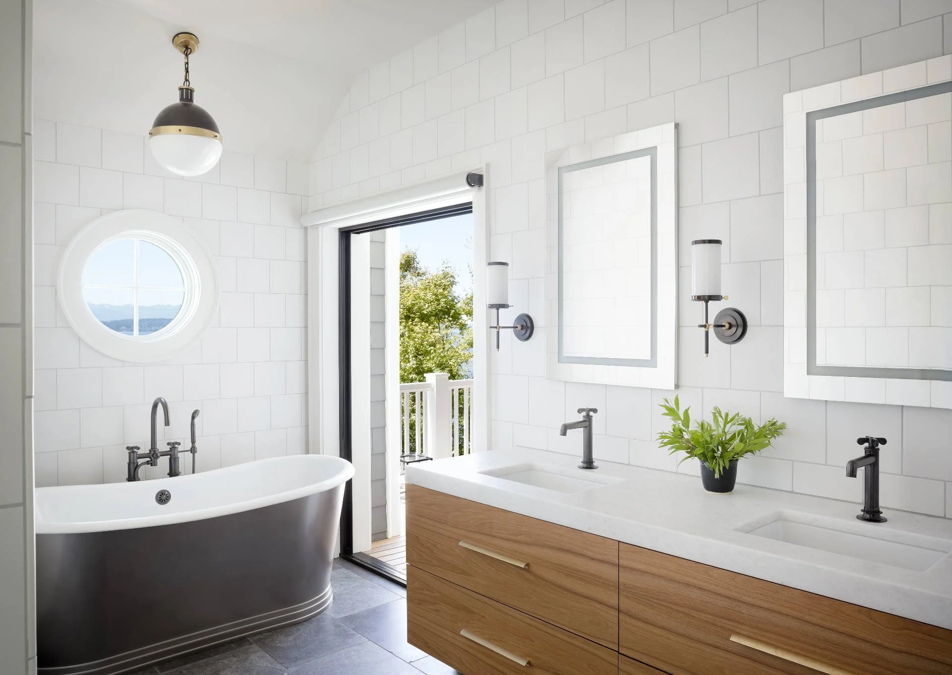 16 -MAGNOLIA-SEATTLE-RESIDENTIAL-ARCHITECTURE-PRIMARY-BATHROOM-SOAKING TUB-VANITY-HERO.jpg