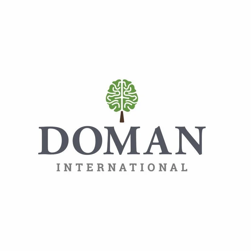 Doman International Logo