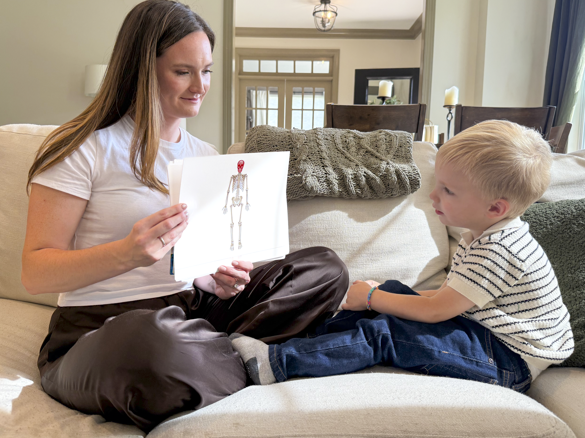 Mom Child Doman Card Skeletal System Illustration.png