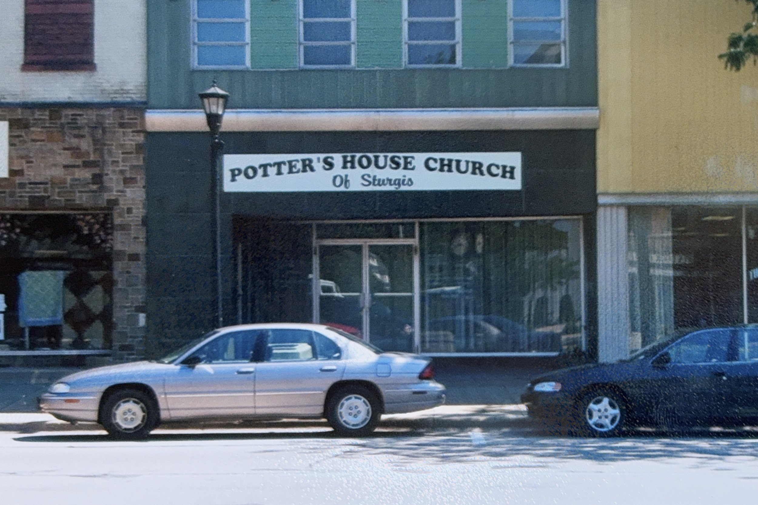 Street view of a small town row of shops