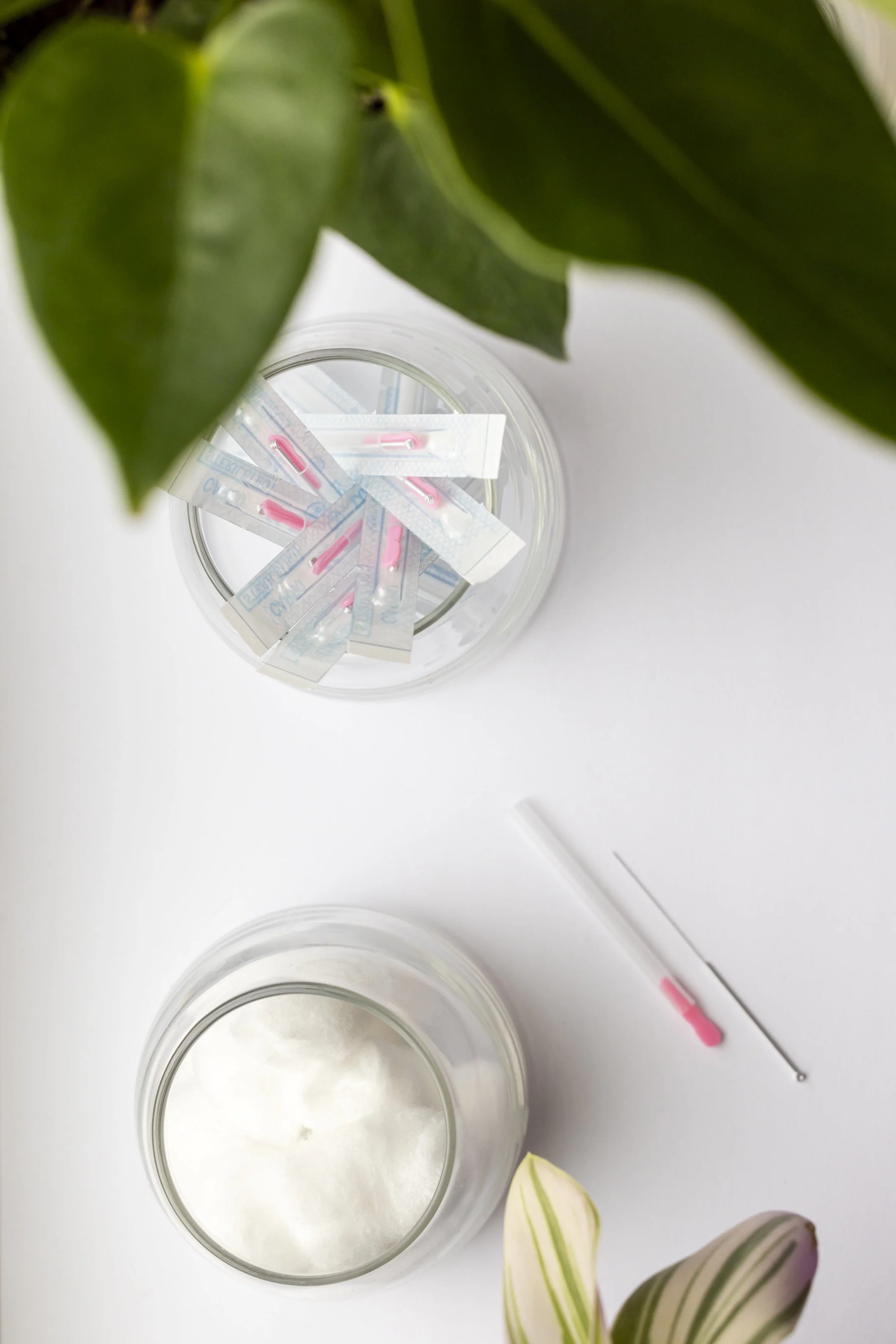 Acupuncture needles are in a glass jar on a table. Bruce Village Chiropractic offers acupuncture therapy as a standalone treatment and as an integrated therapy in Port Elgin, Saugeen Shores, and Bruce County Ontario.