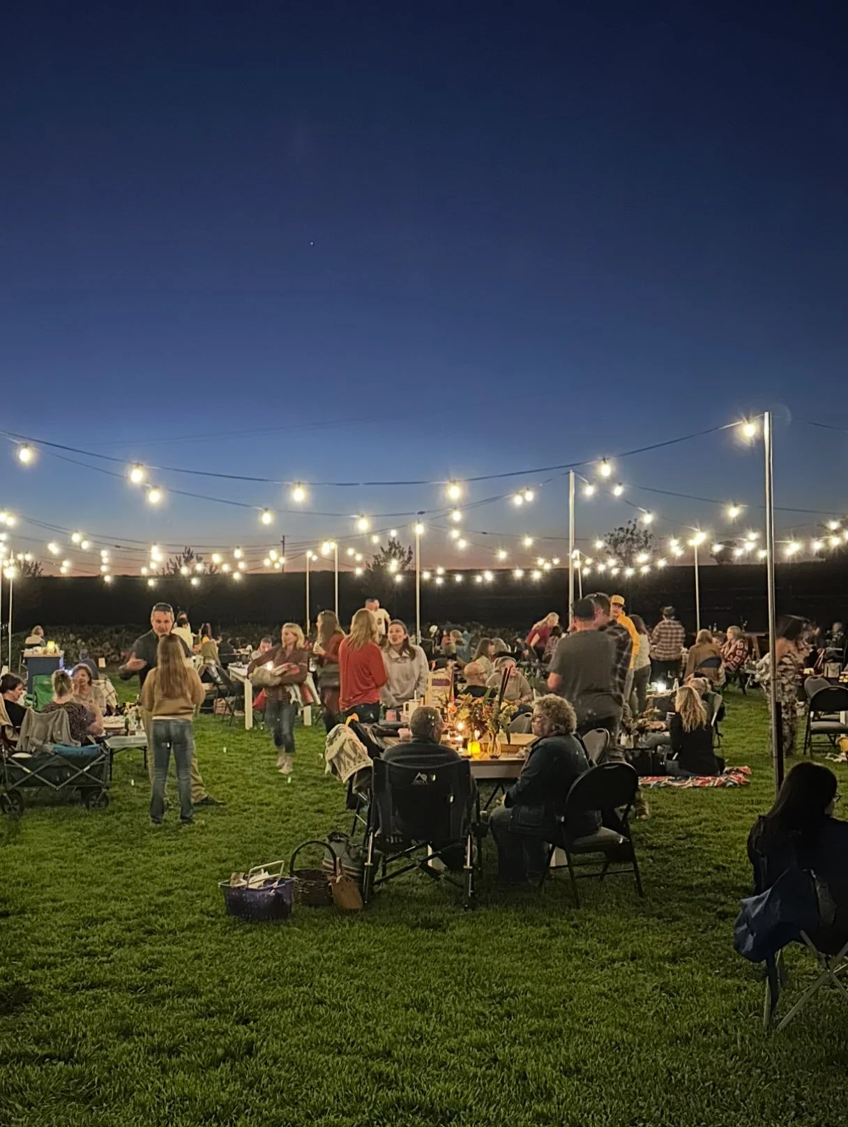 ASSIGNMENT UNDERSTOOD. The stemware showed up, and we took the hint.

At our first Grown-Up Pumpkin Patch, folks came with blankets and camp chairs. In year two, someone brought a tablecloth. Last year the stemware arrived and someone hauled in an ac