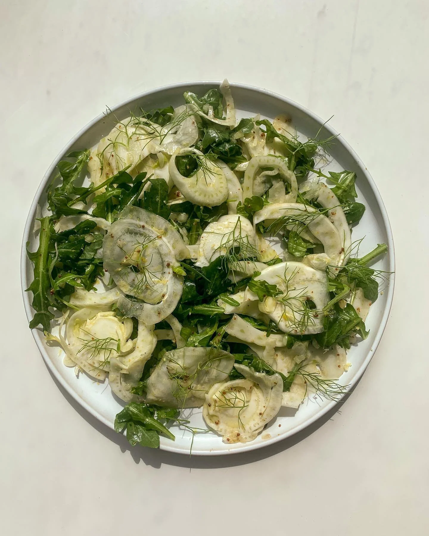 Don&rsquo;t overlook the cute fennel bulb in your neighborhood supermarket. It&rsquo;s sweet but still a little snappy, and a little like liquorice in taste. Trying out the Fennel and Arugula salad garnished with fresh fennel herb by @foodandwine. 10