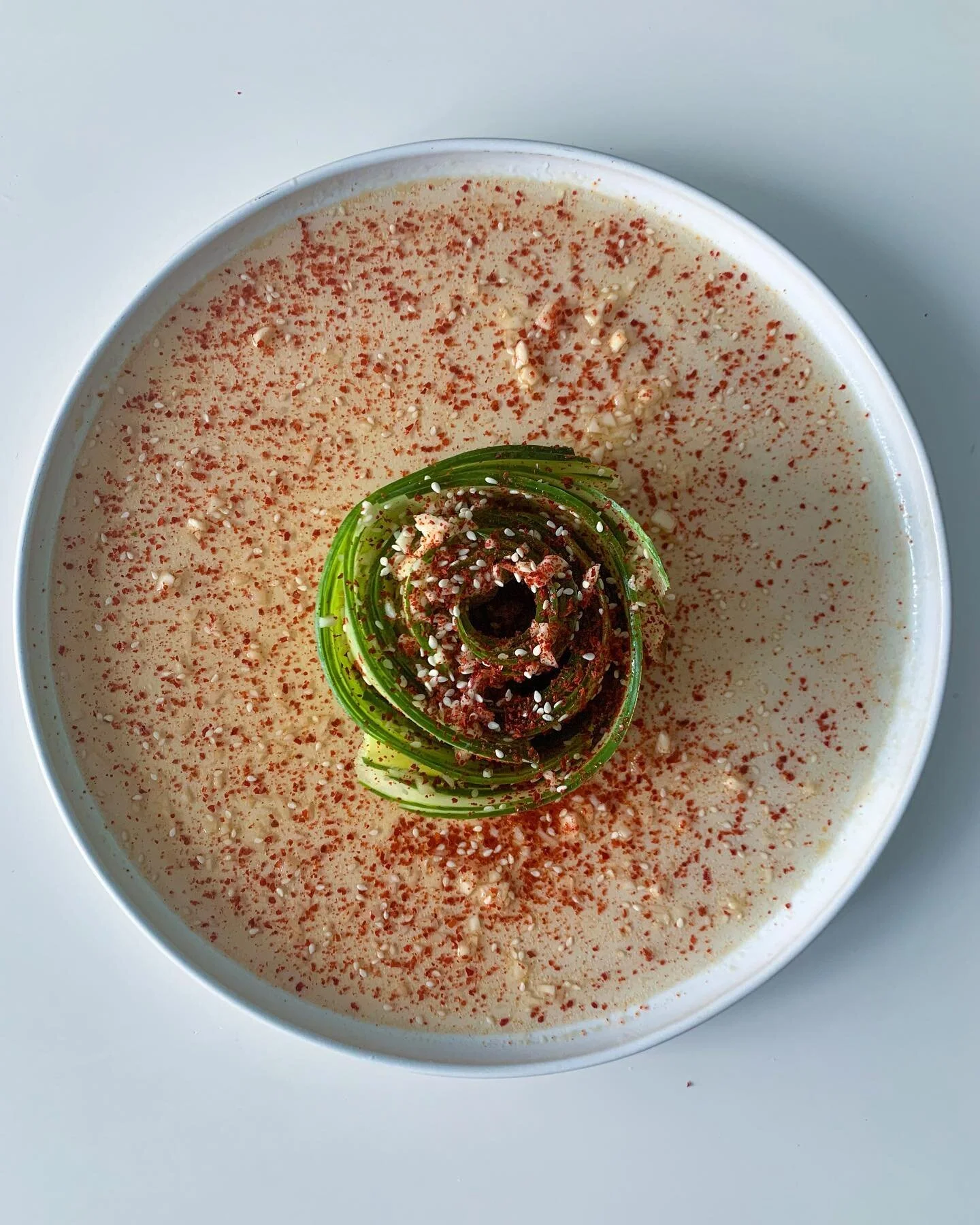 Peak-a-boo says @thefoodietakesflight &lsquo;s Rose Cucumber Salad! Recipe linked in the highlights section! Cooling, refreshing, and impressive as a first course to your meal.