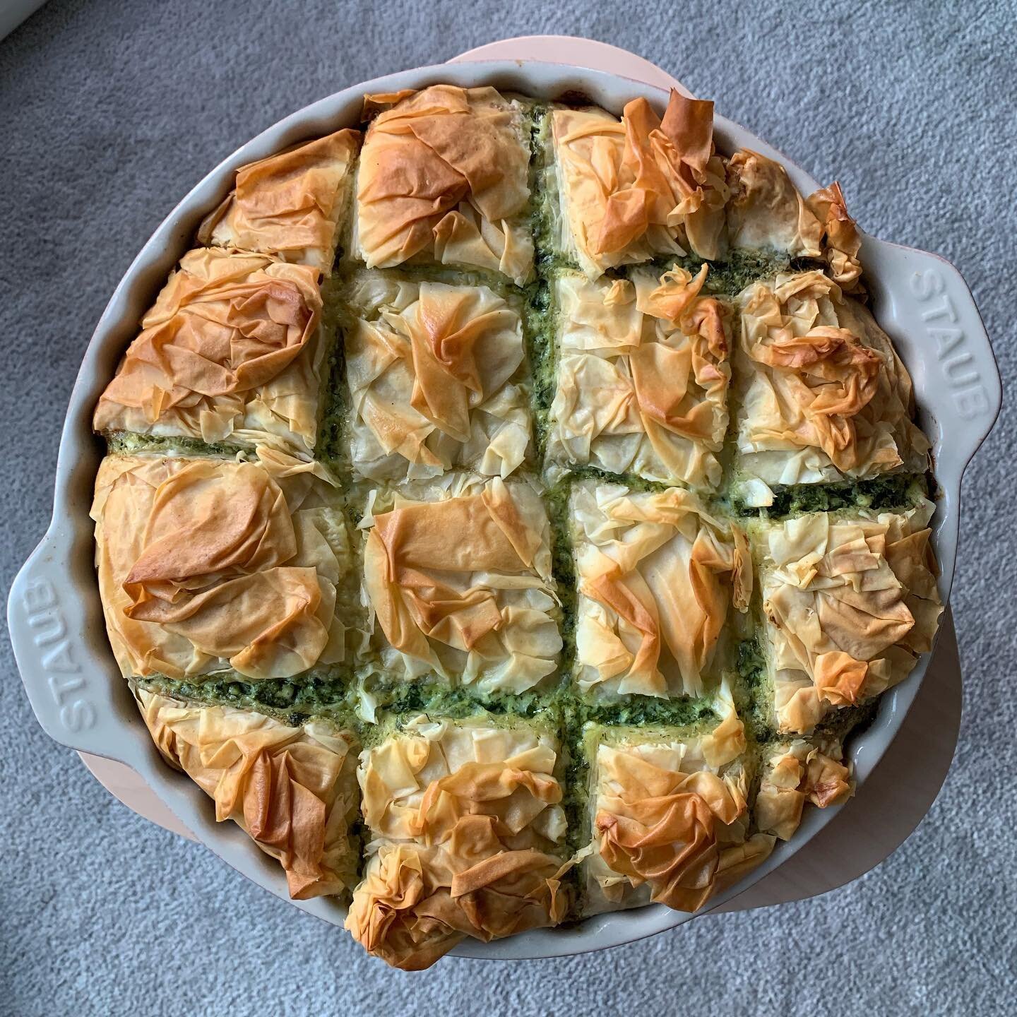 Love this spanakopita from @dimitras.dishes! Should have cut this pie style but muscle memory took over!