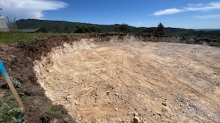 A view of the cleared ground for the tank foundation