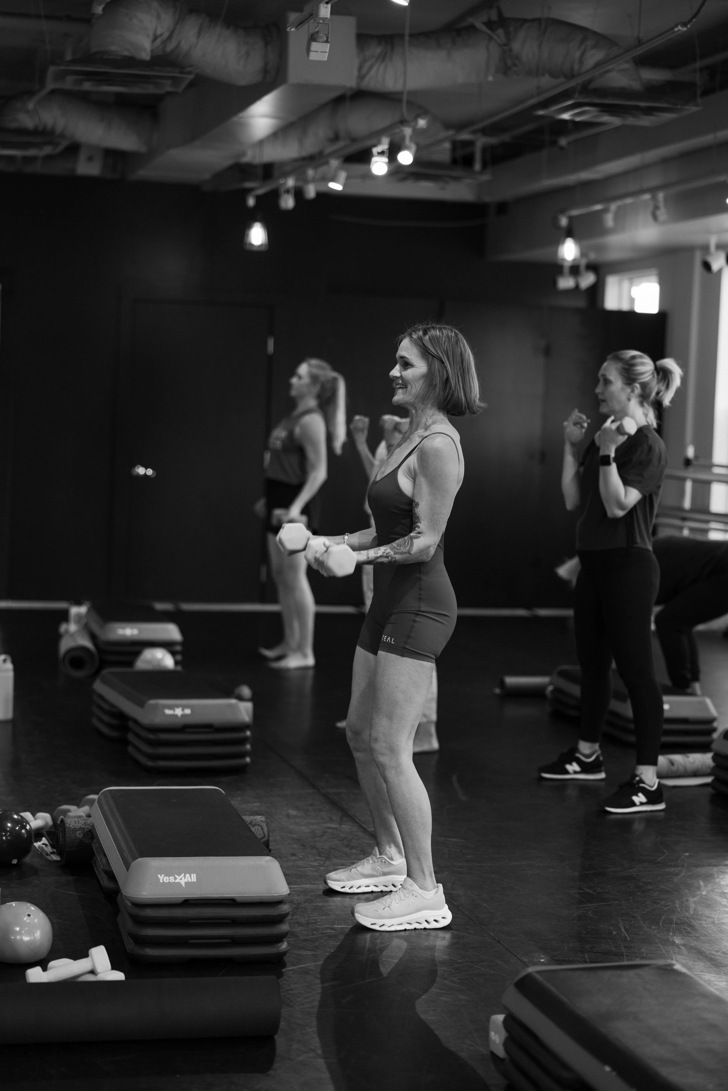 Lifting weights in a women-centric fitness class on Kauai, for all ability levels