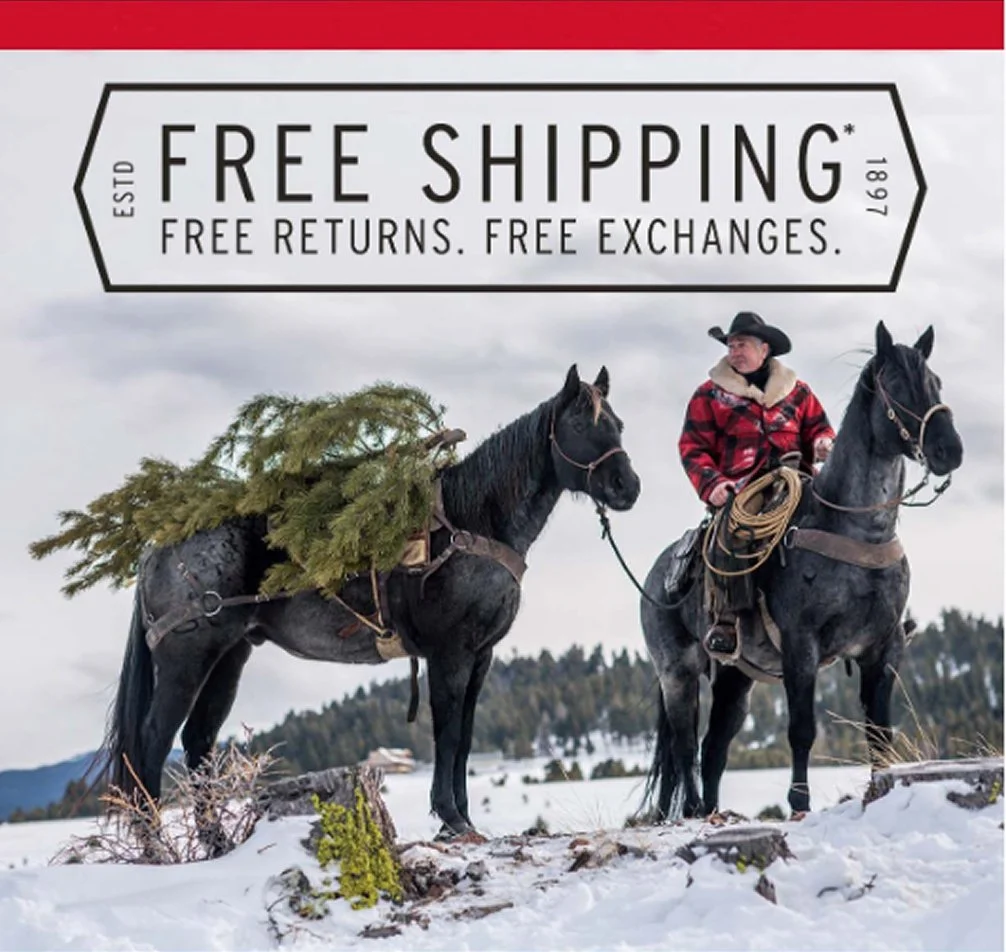 A man on a horse wearing the Lined Wool Packer. He is holding the reigns of another horse carrying a Christmas tree. Above is a free shipping message.