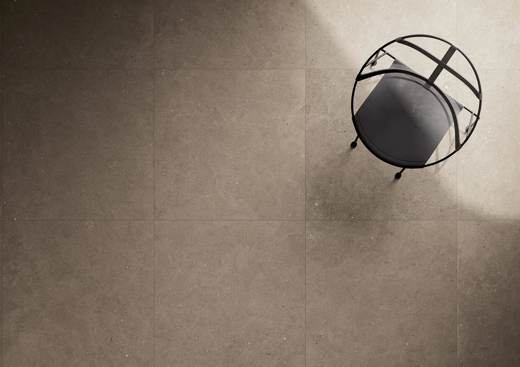 Matte concrete look porcelain tile ideal for modern residential interiors.