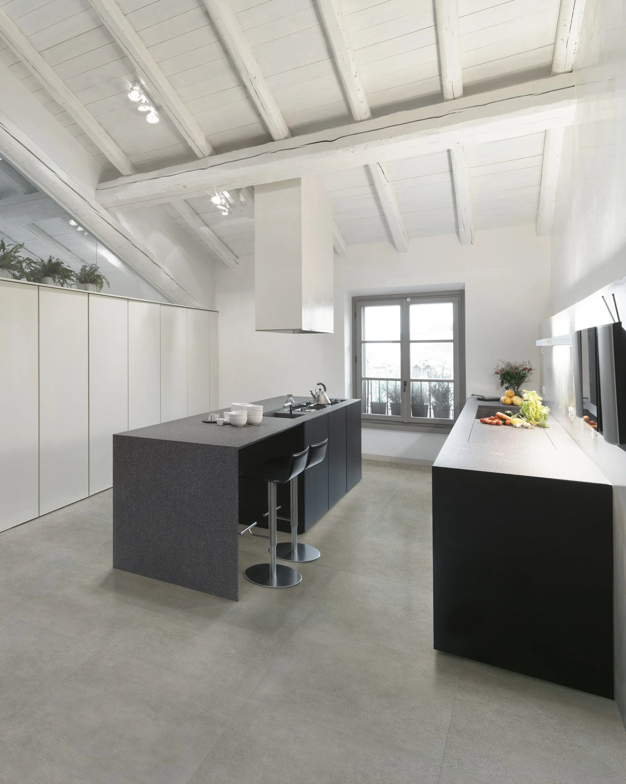 Concrete look porcelain tile flooring with subtle surface movement.