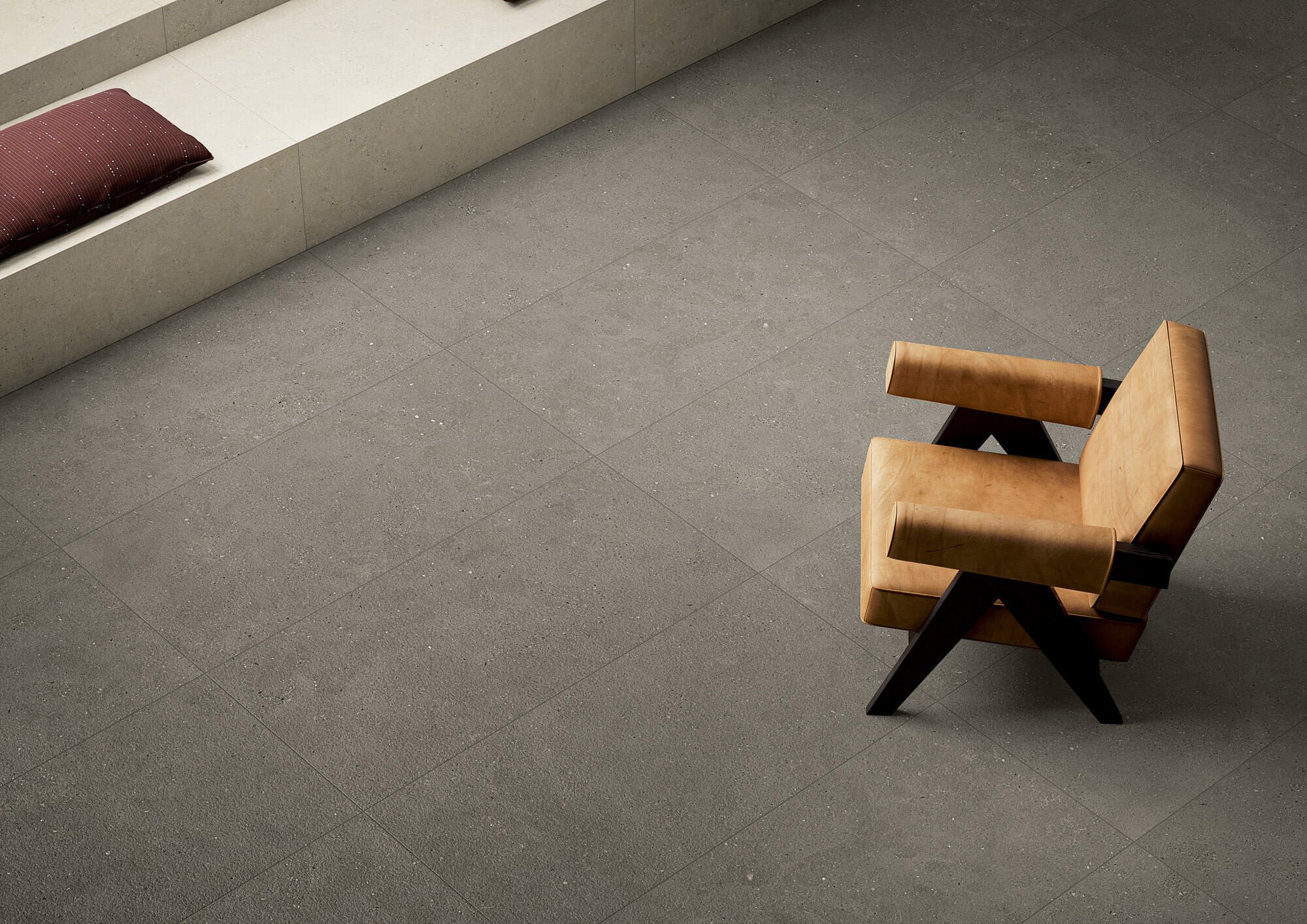 Concrete look porcelain tile flooring offering durability and timeless style.