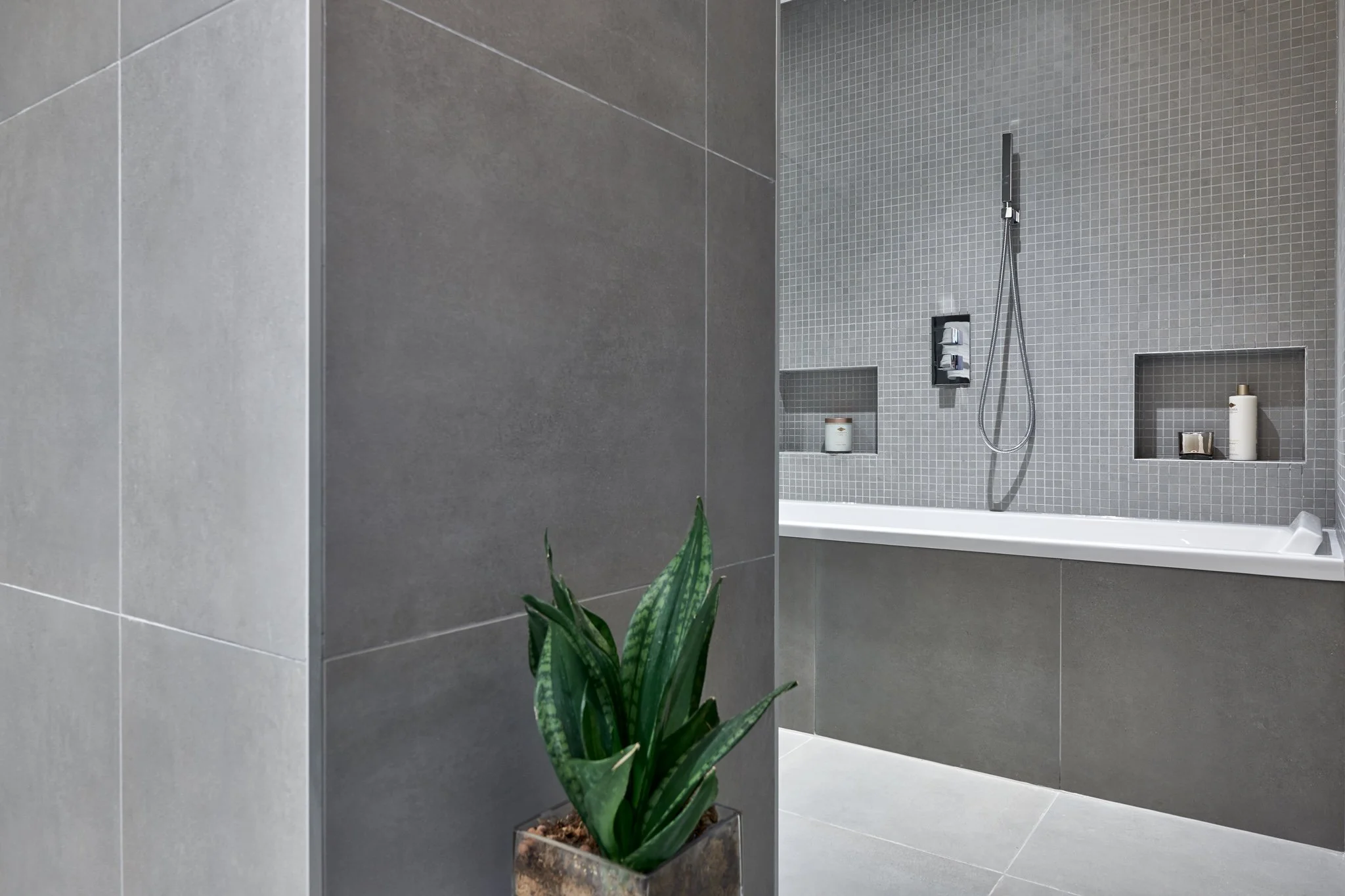 Modern Toronto interior featuring concrete effect tile flooring.